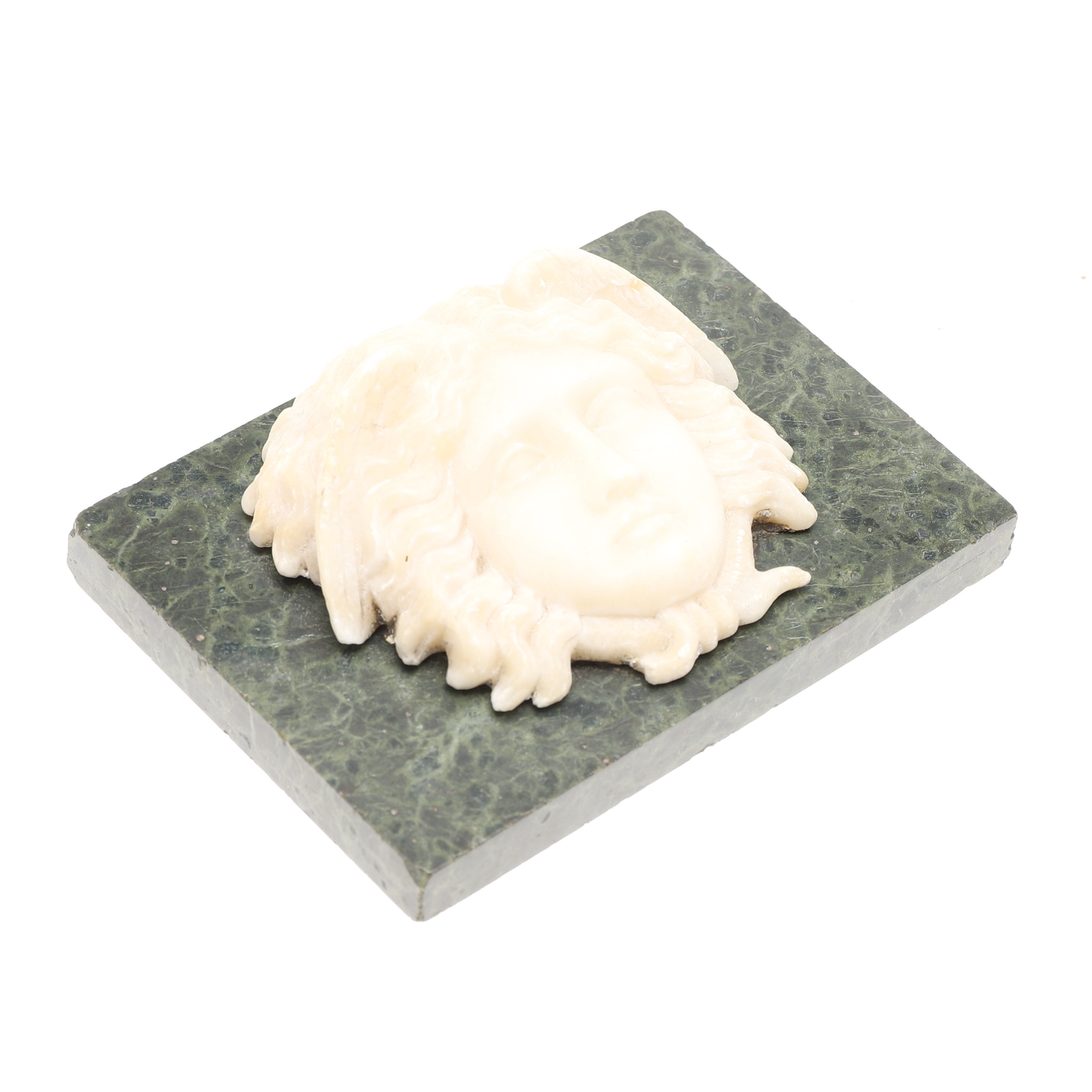 Images for 2814004. A TWO COLOUR CARVED MARBLE MEDUSA’S HEAD PAPERWEIGHT OR TABLET.