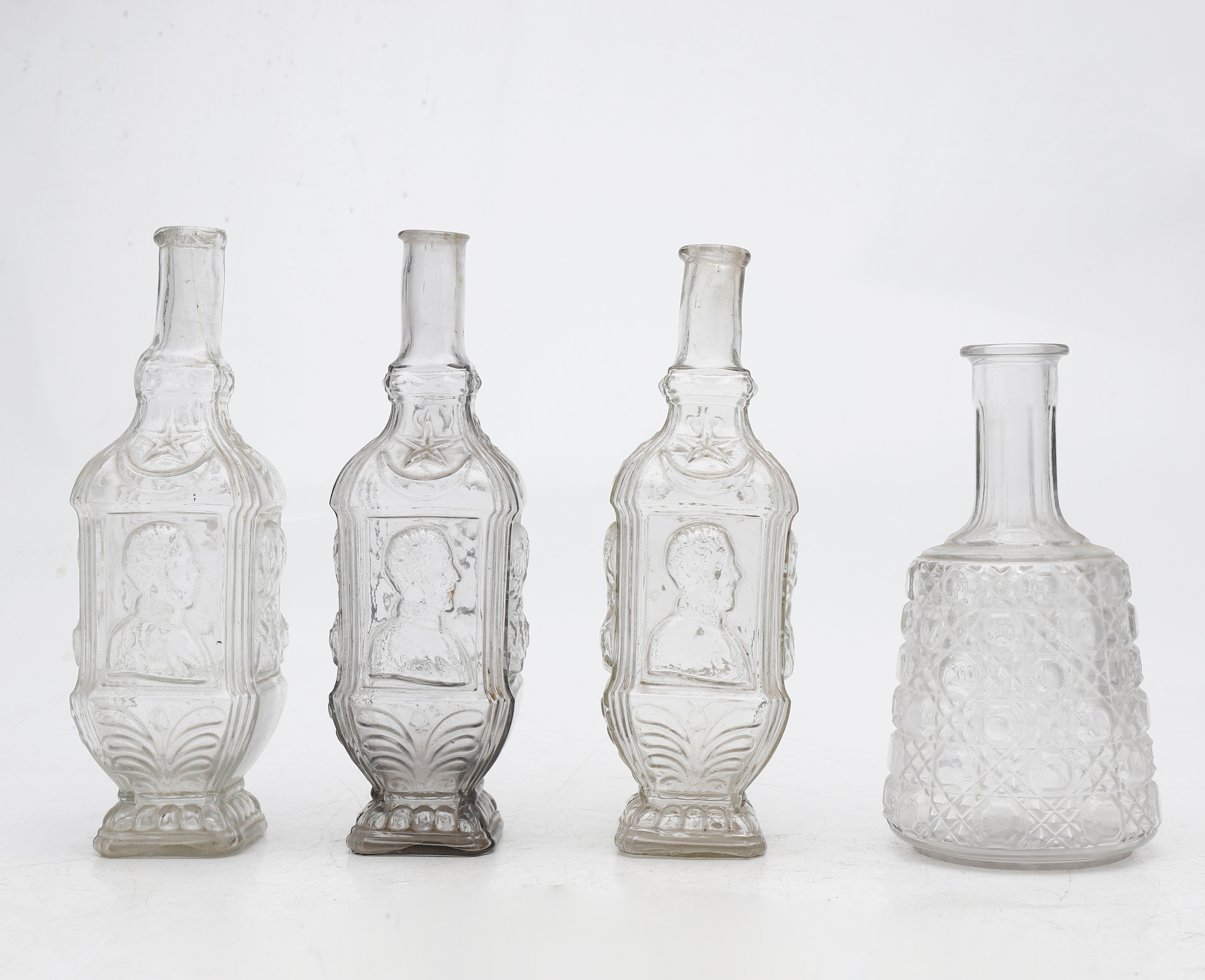 images-for-2960881-four-blown-and-moulded-glass-bottles-early-decades