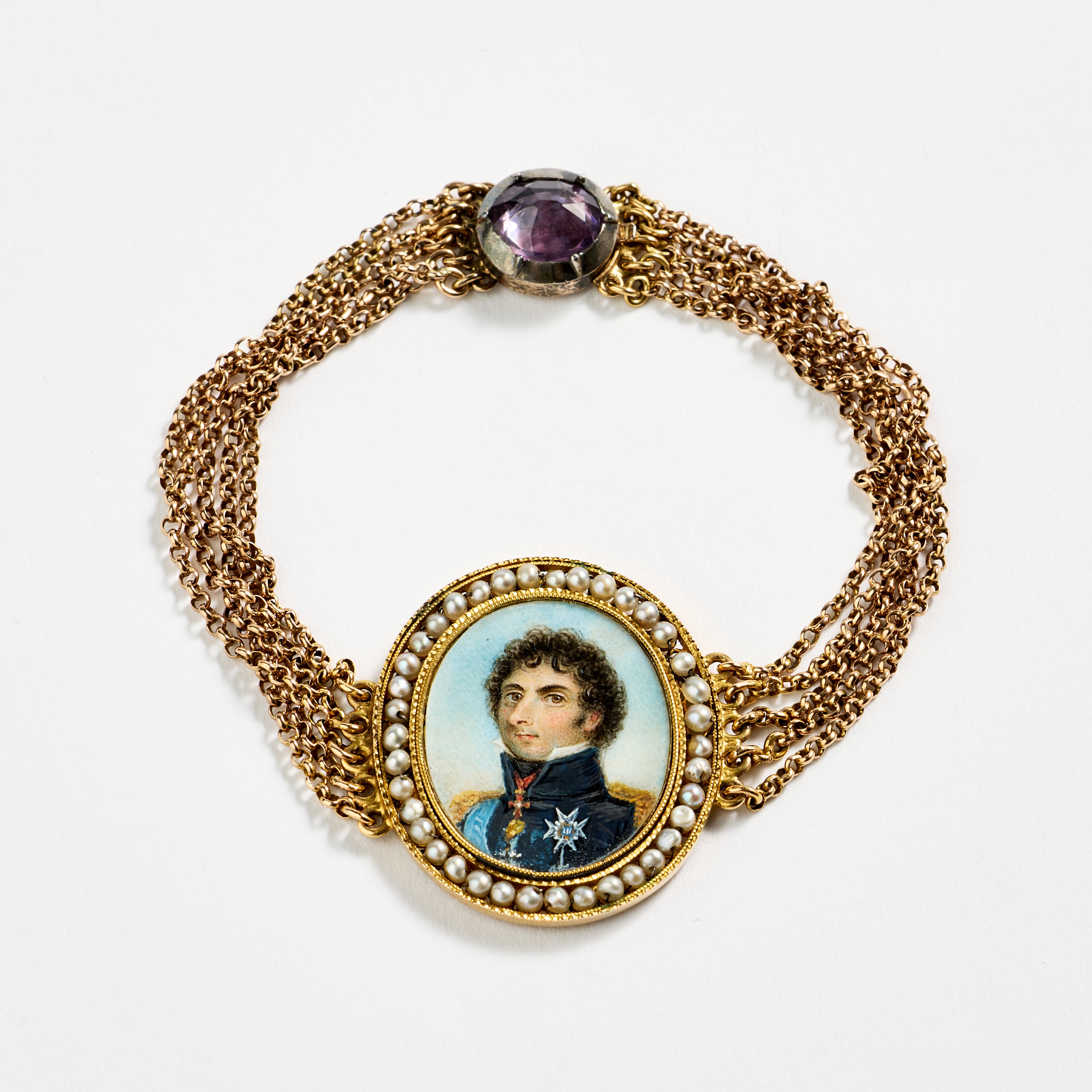ARMBAND, 18K guld och fröpärlor med en miniatyrmålning föreställande Karl XIV Johan, empire, Christian Diedric Wancke, Stockholm 1813.