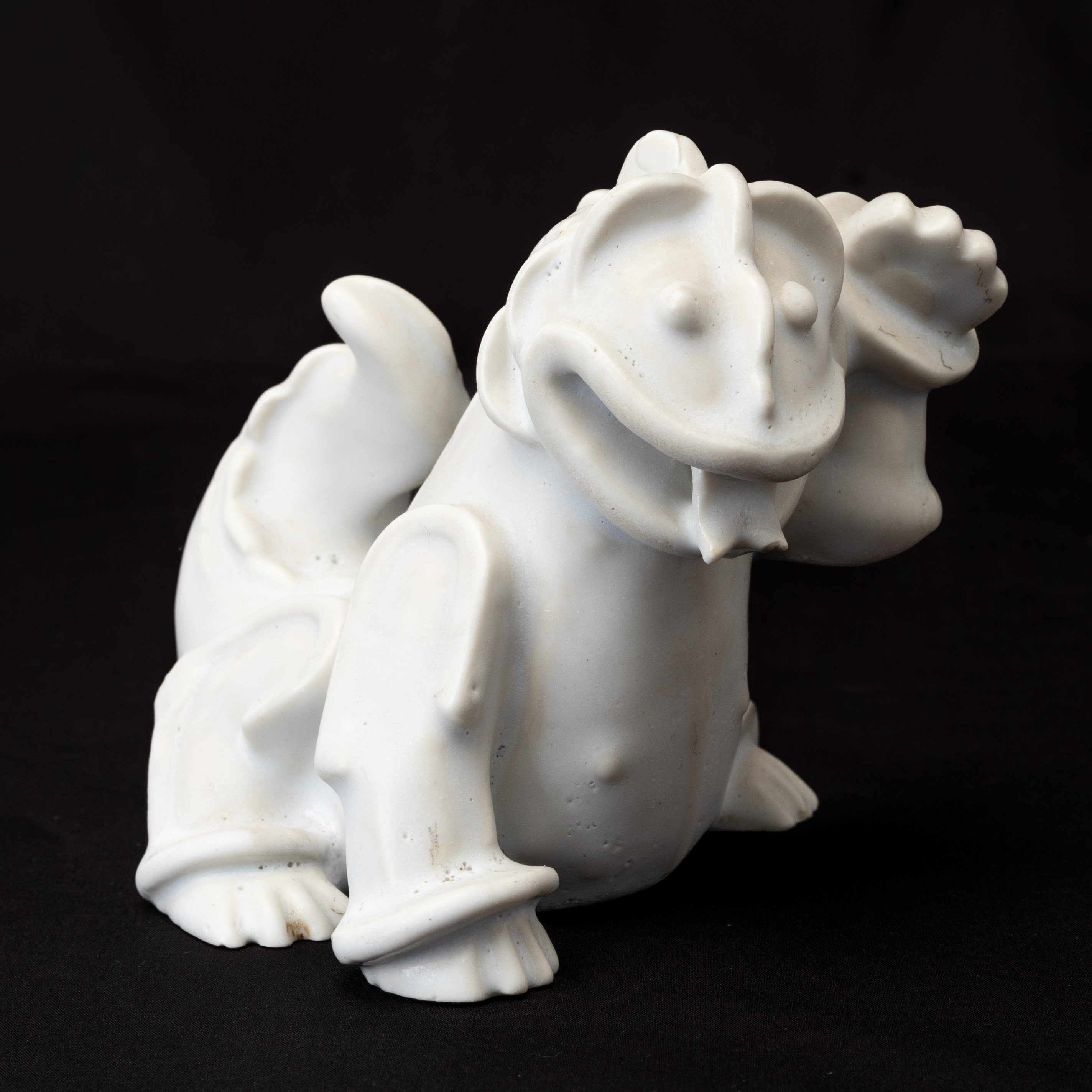 WILHELM KÅGE. Figurin, "Drakvalp", vitt carraragods, studiohanden, stämpelmärkt, Gustavsberg, 1940/50-tal.