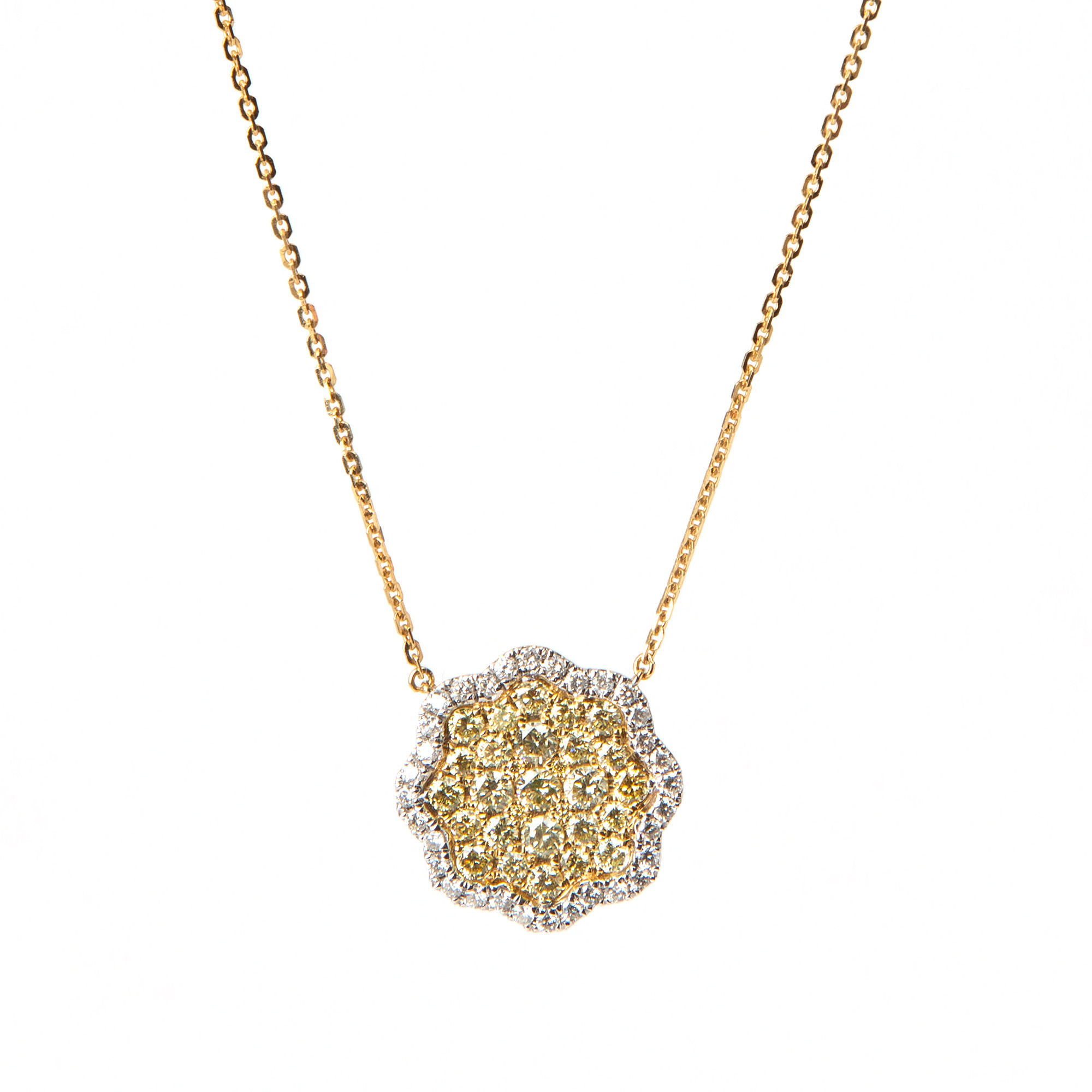 COLLIER, 18k guld och vitguld med briljantslipade vita och gula diamanter, totalt ca 3.52 ct.