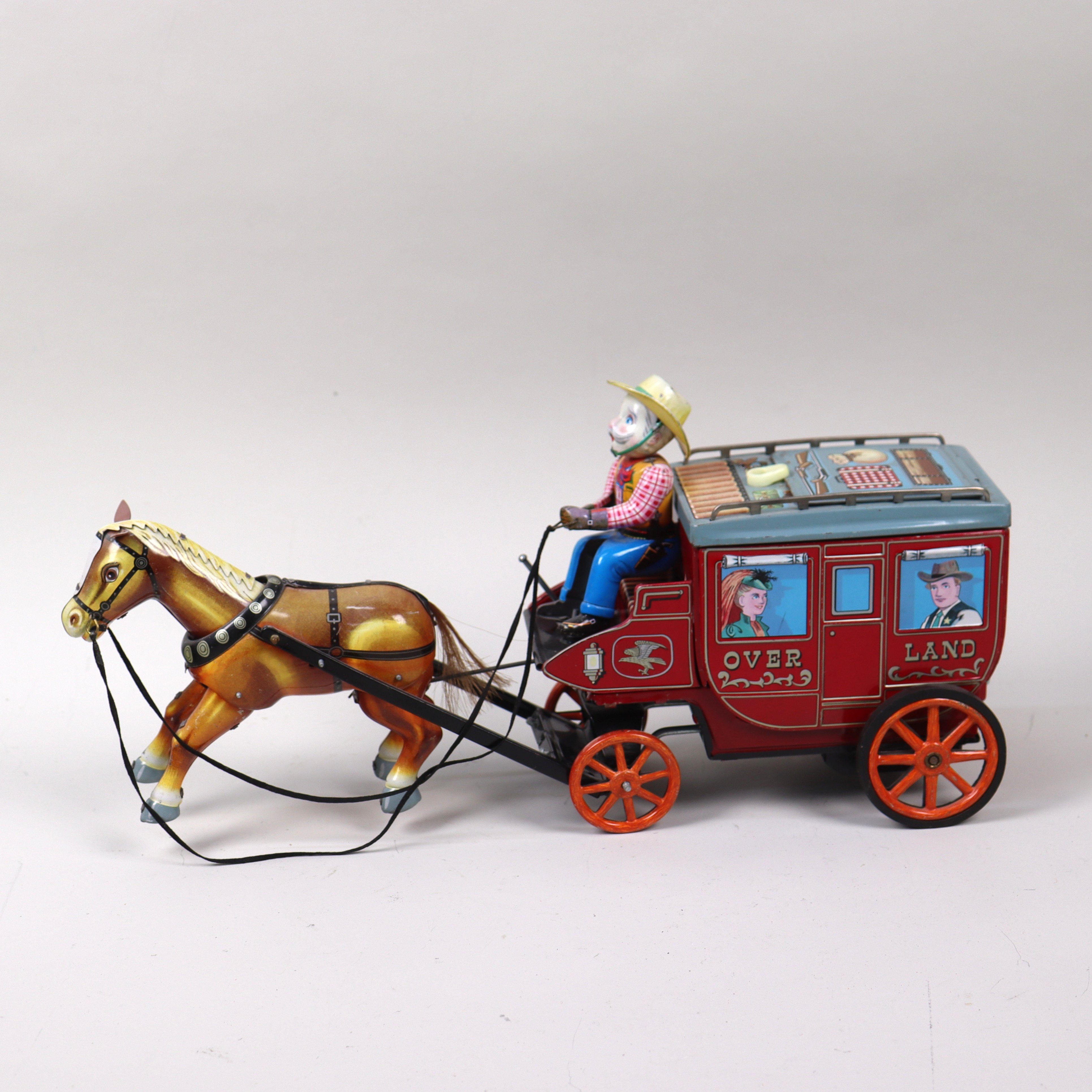 PLÅTLEKSAK, "Overland Stagecoach", A Cragstan Toy #71271, Ichida Japan, batteridriven diligens.