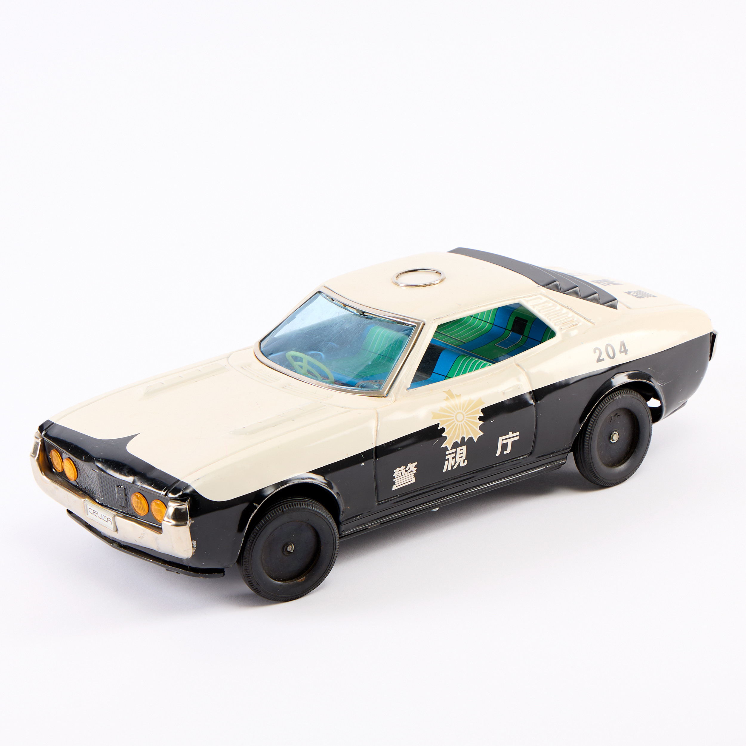 LEKSAKSBIL, Celica, Asahi toy, Japan. 1900-talets andra hälft. Plåt.