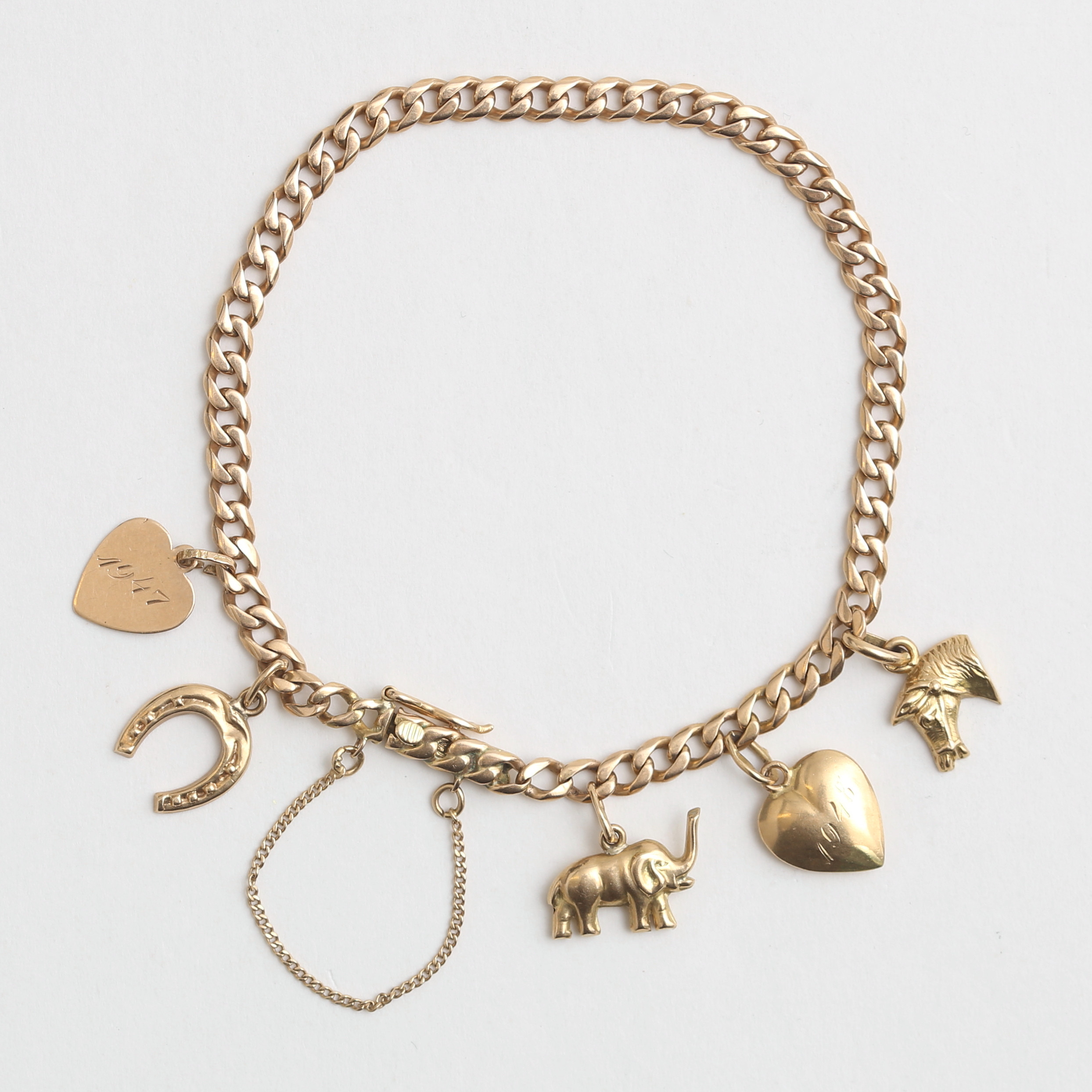 ARMLÄNK, pansar med 5 st BERLOCKER 18 k guld, 9,46 gram.