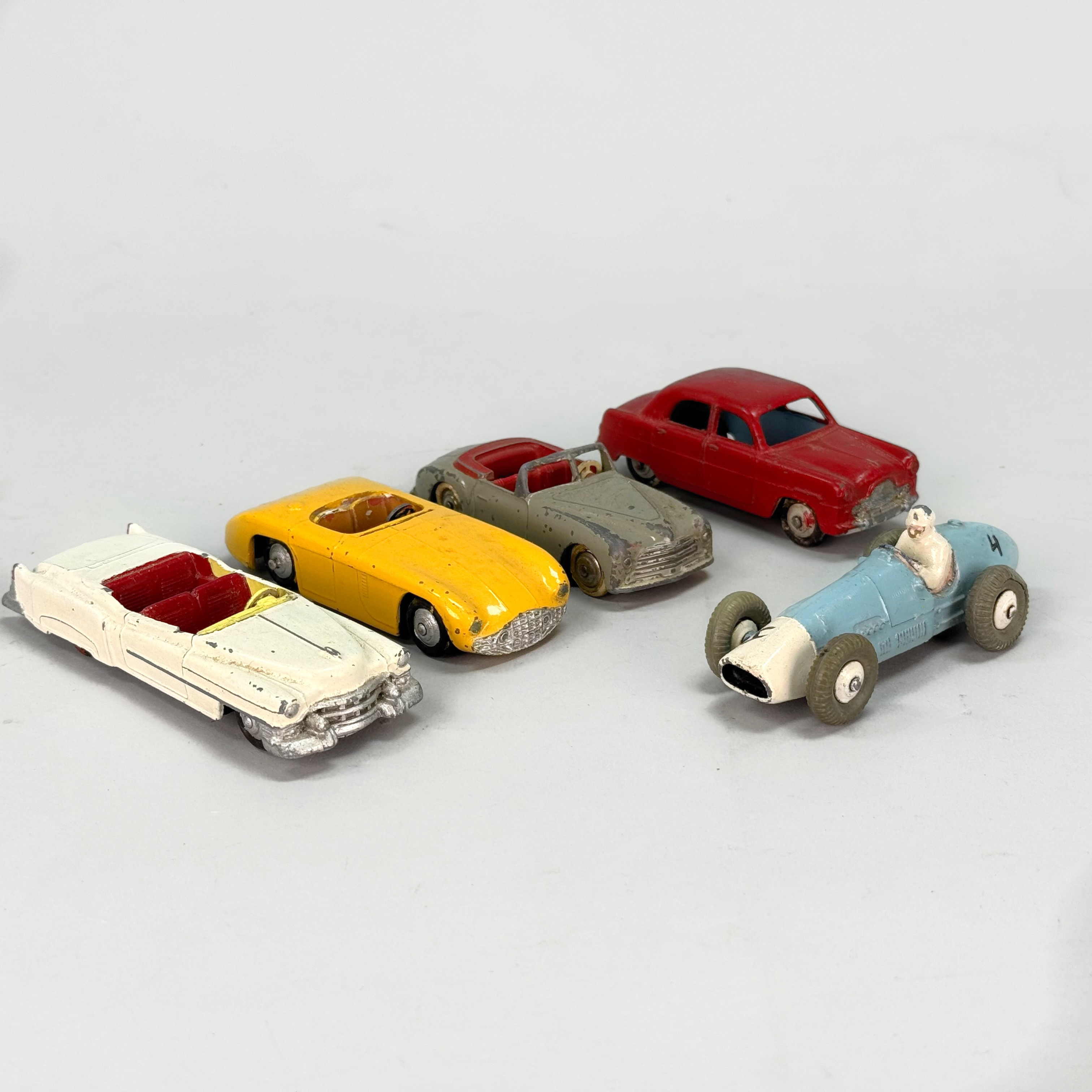 DINKY TOYS - Made in England, Ford Zephyr, Simca 8 Sport, Cadillac Eldorado, Cunningham, Ferrari.