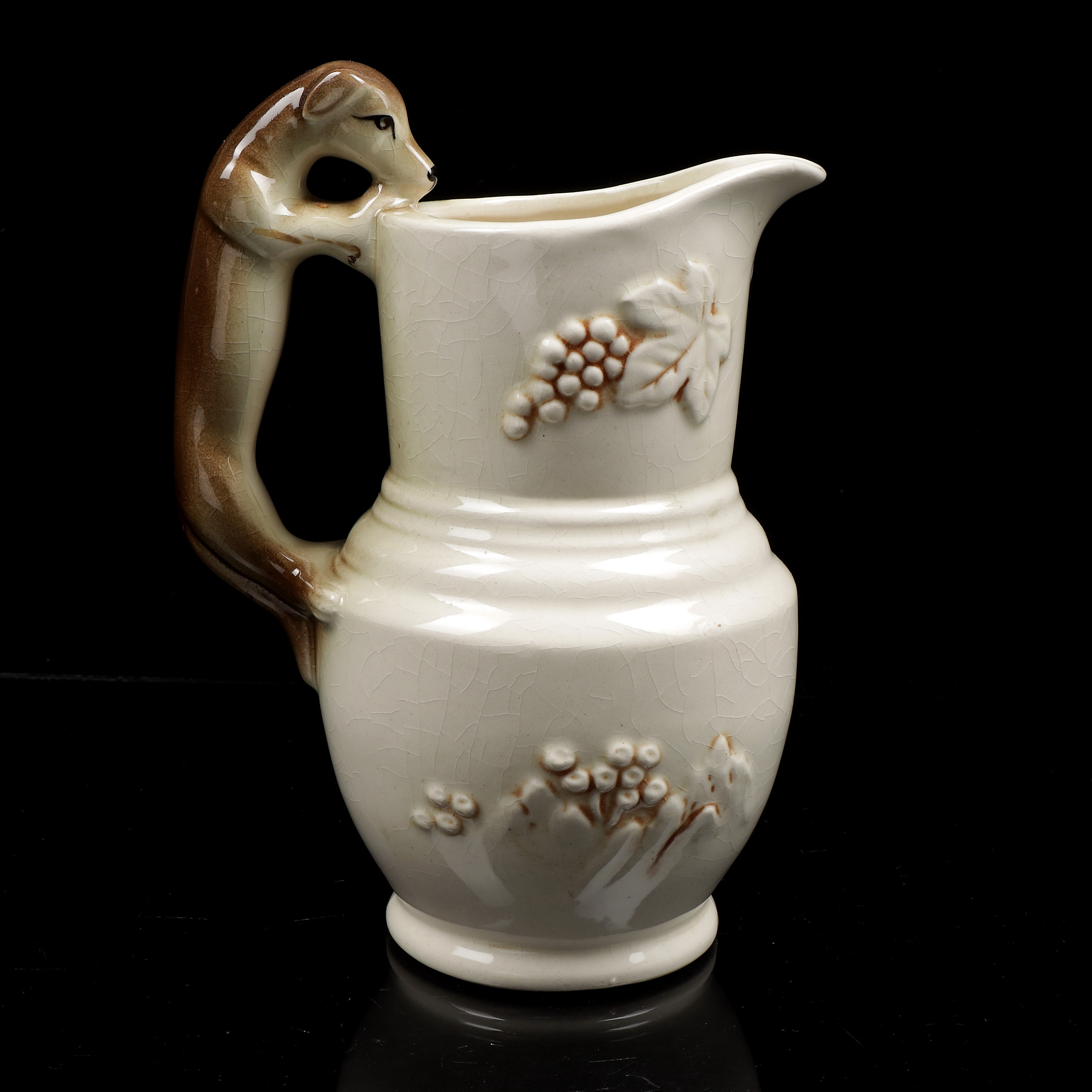 KANNA, handtag i form av hund, keramik, 1900-talets första hälft.