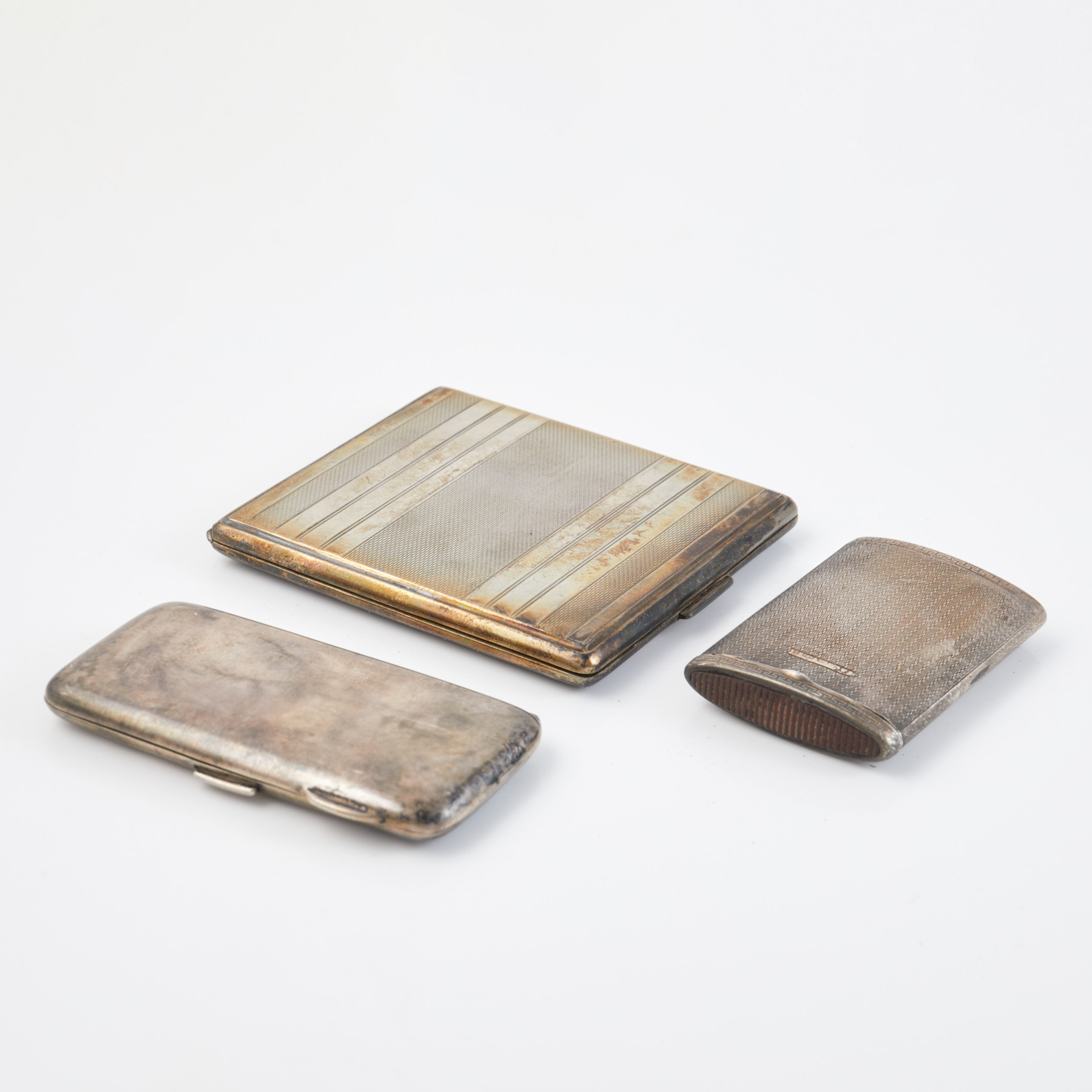 CIGARETTETUIER/TÄNDSTICKSASK, 3 dlr., silver, bland annat Birmingham, 1900-talets första hälft.