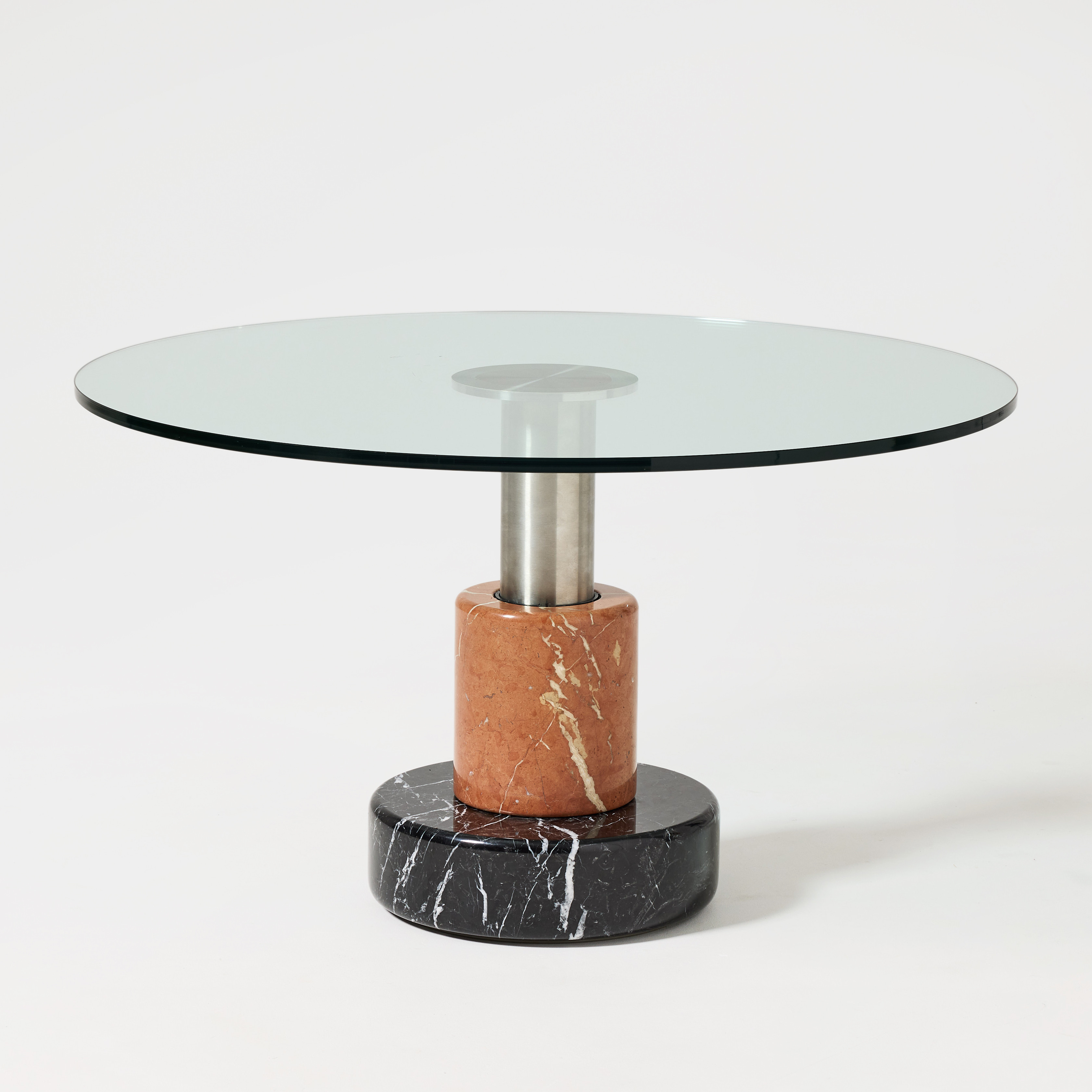 GIOTTO STOPPINO. "Tavolo Menhir", soffbord, 1980-tal, marmor och stål, skiva i glas.