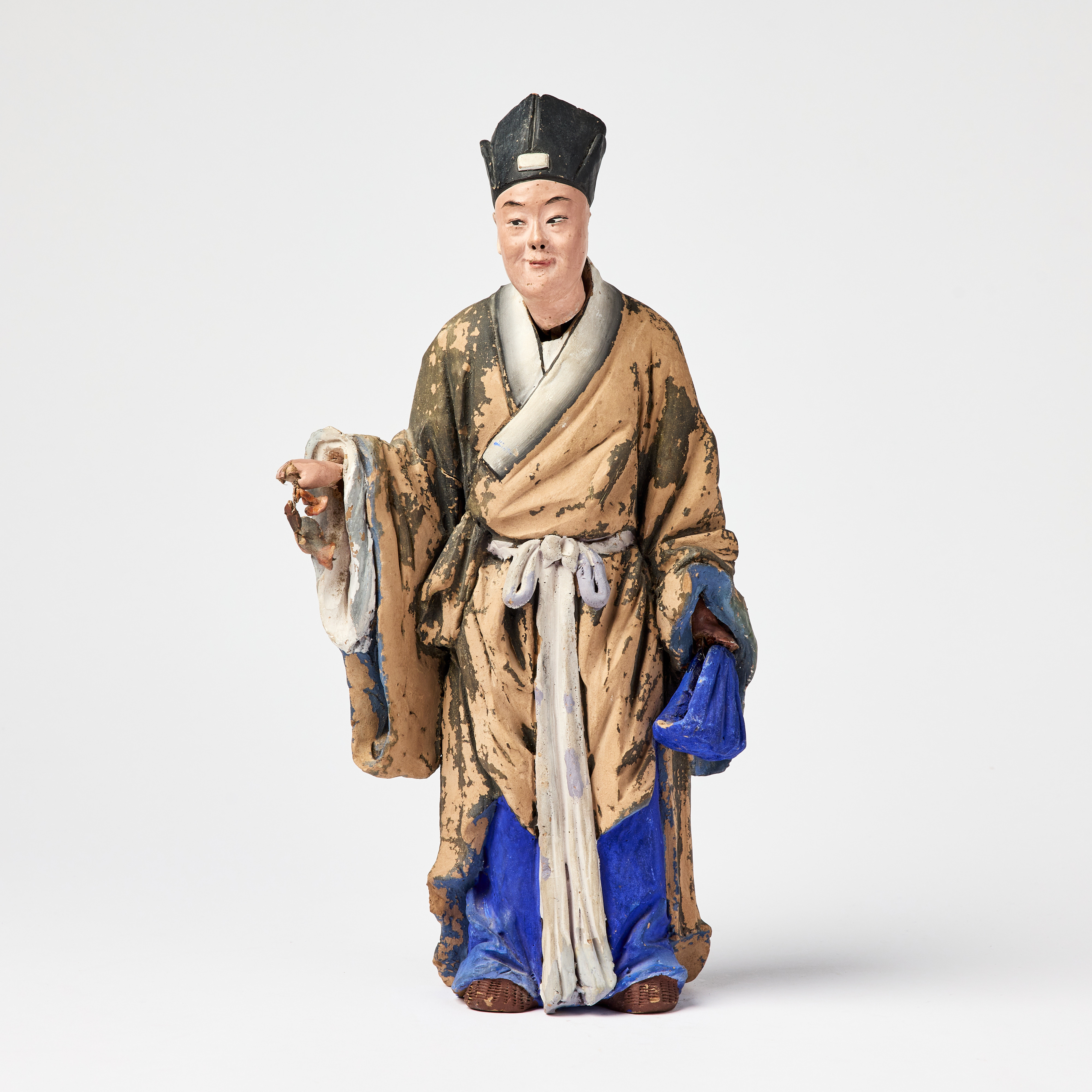 A Chinese Export Nodding Head Figure of a Scholar.