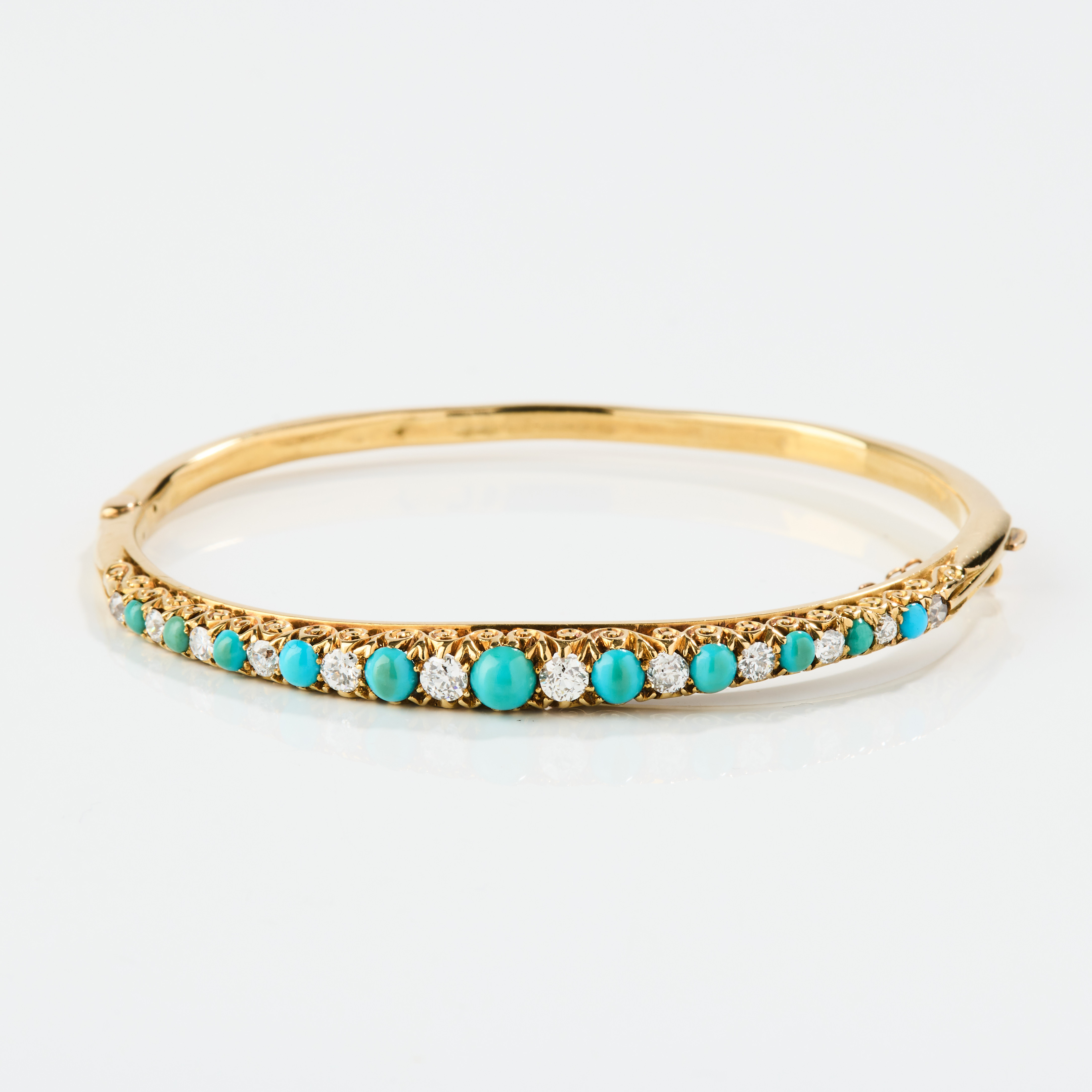 ARMRING, 18K guld, turkoser och diamanter, 1890-tal.