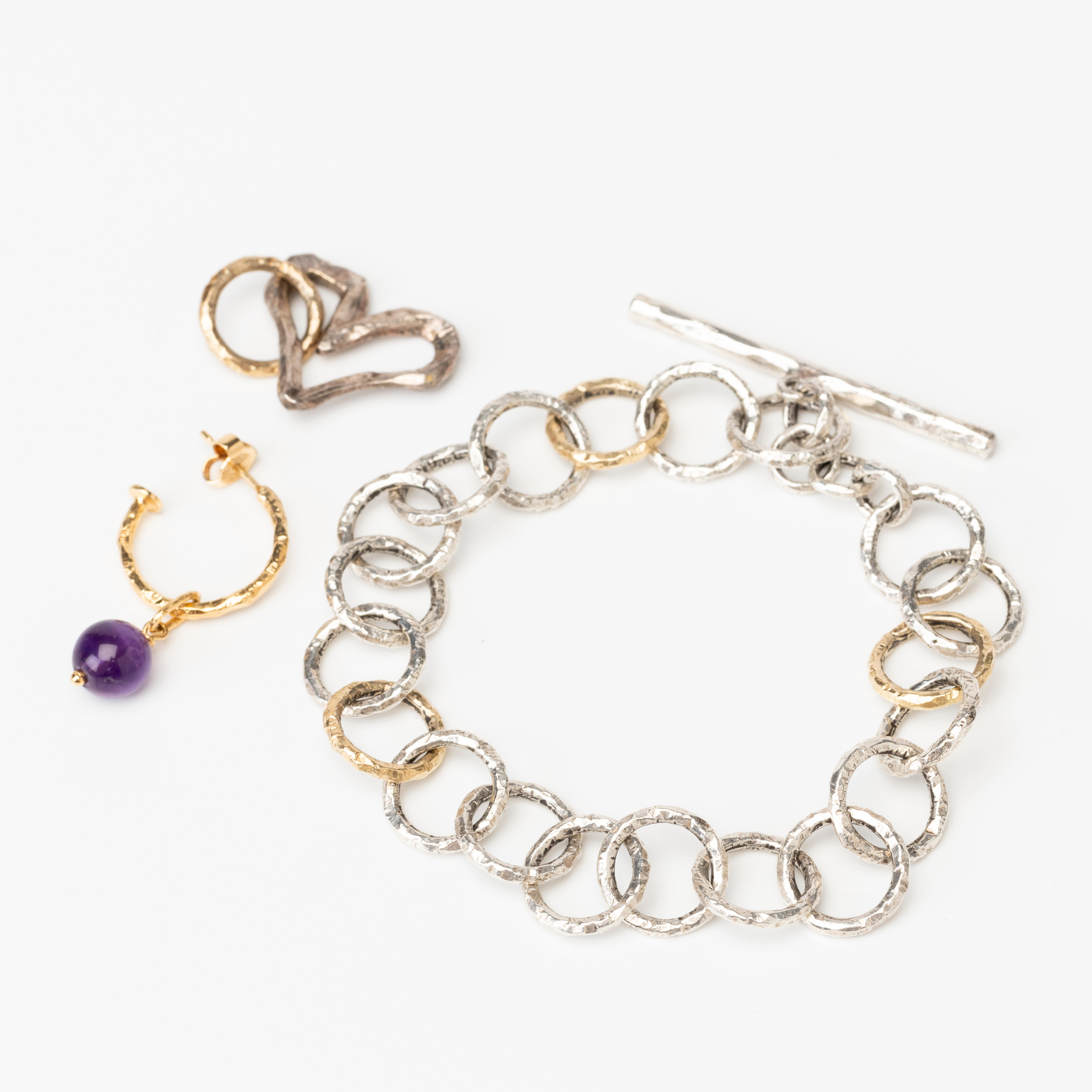 SANDBERG, armband, hänge samt örhänge, sterlingsilver samt 18K guld, samtida.