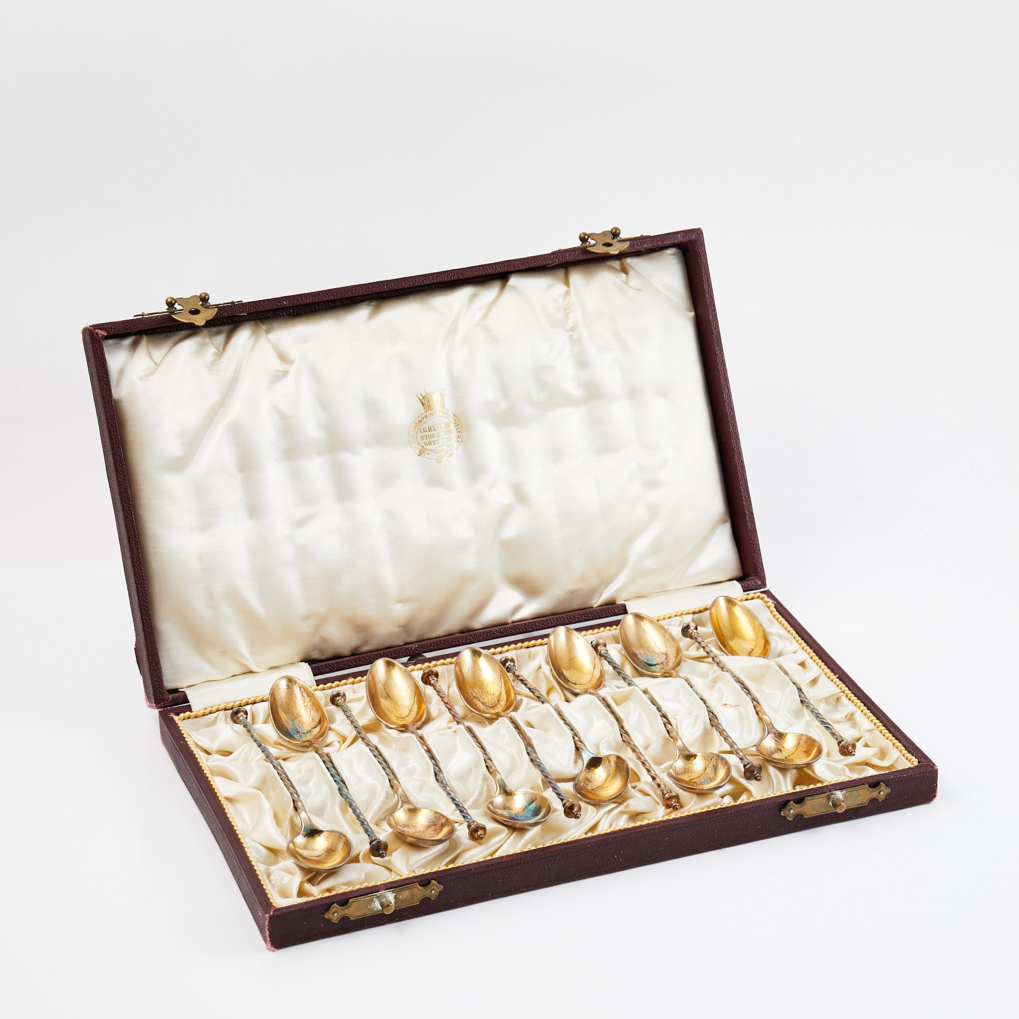 SKEDAR, 12 st, silver, förgyllda, i etui, Stockholm 1875.