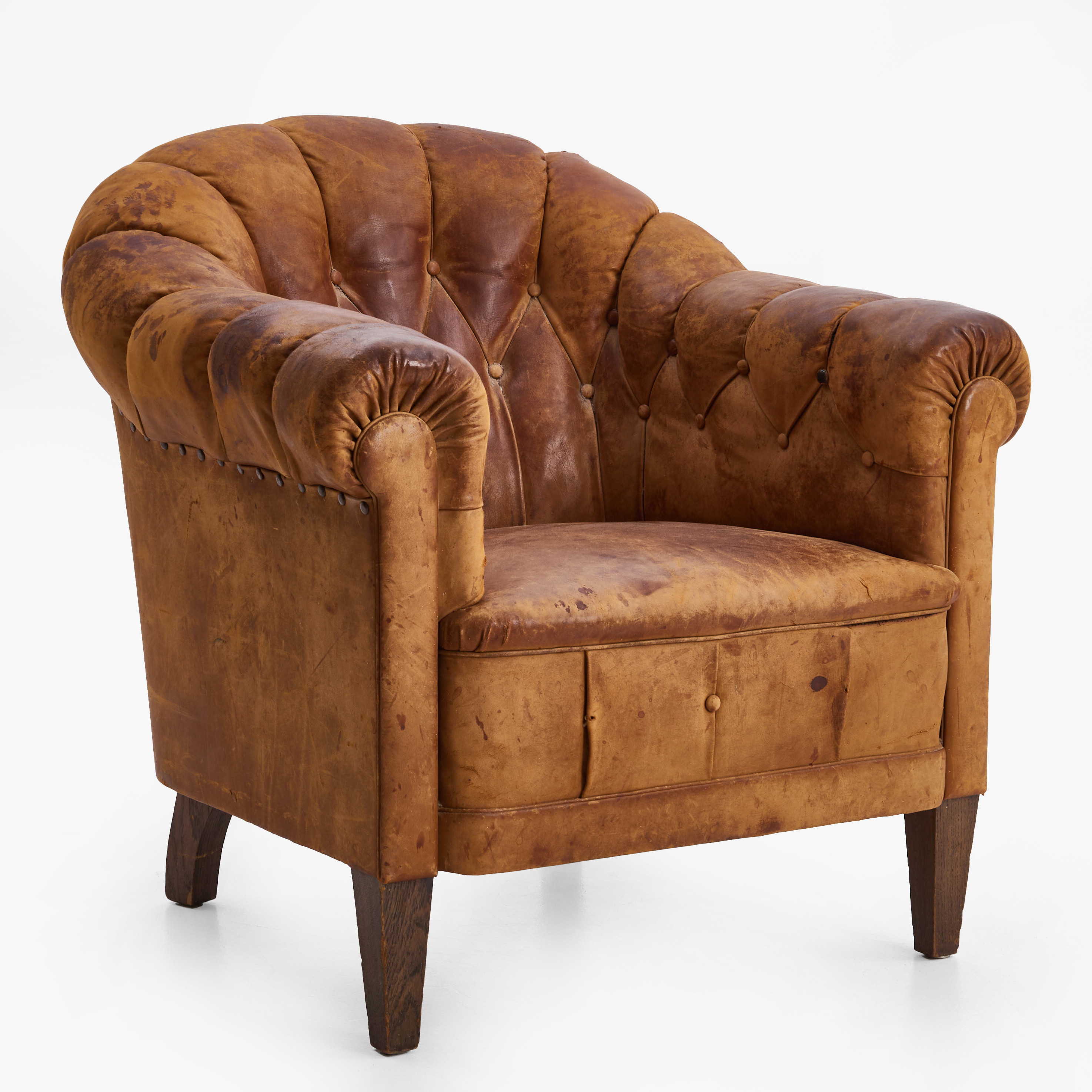 CLUBFÅTÖLJ, 1900-talets början, skinn.