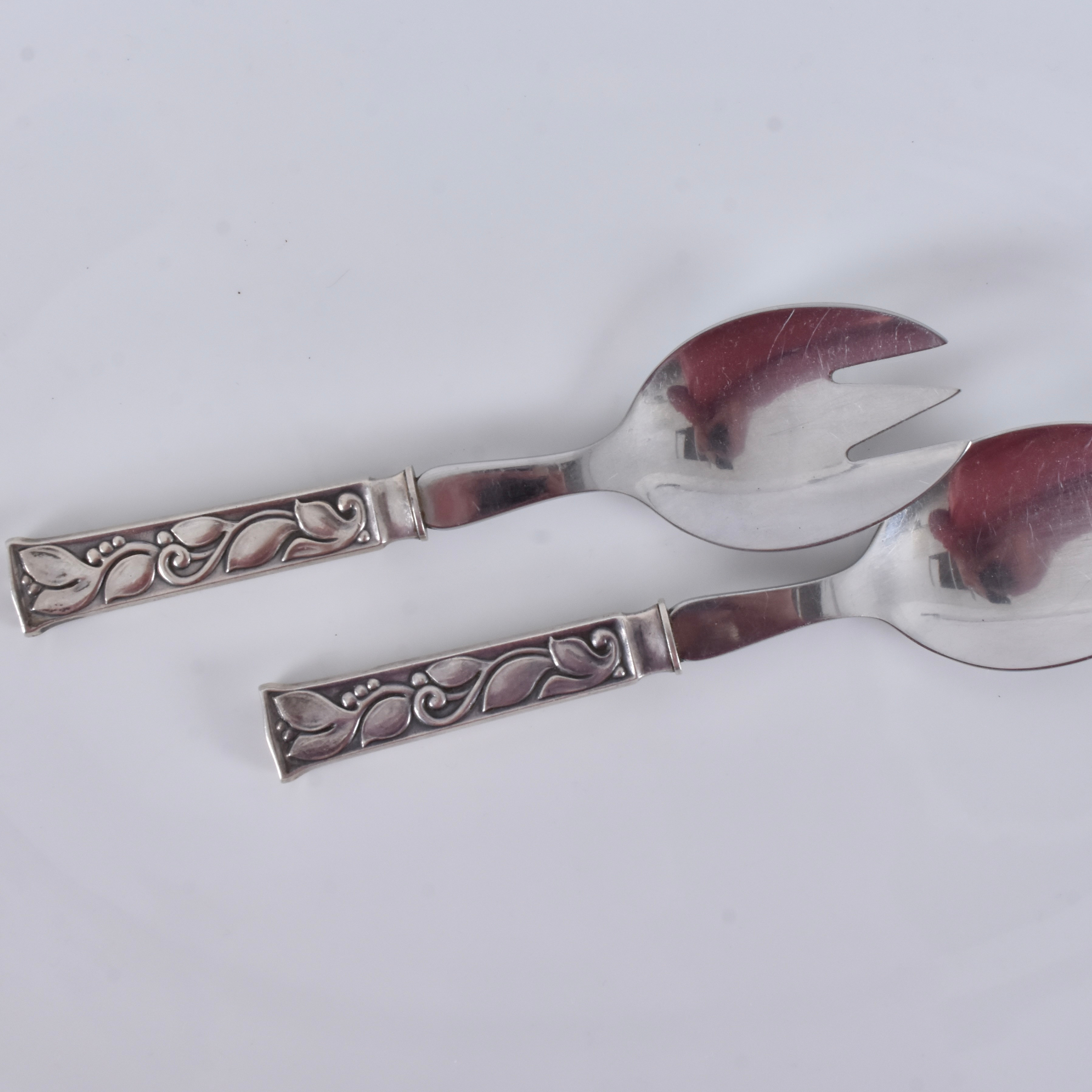 EVALD NIELSEN. SERVERINGSBESTICK, 1 par, sterlingsilver och rostfritt stål, modell no 30 (leaf).