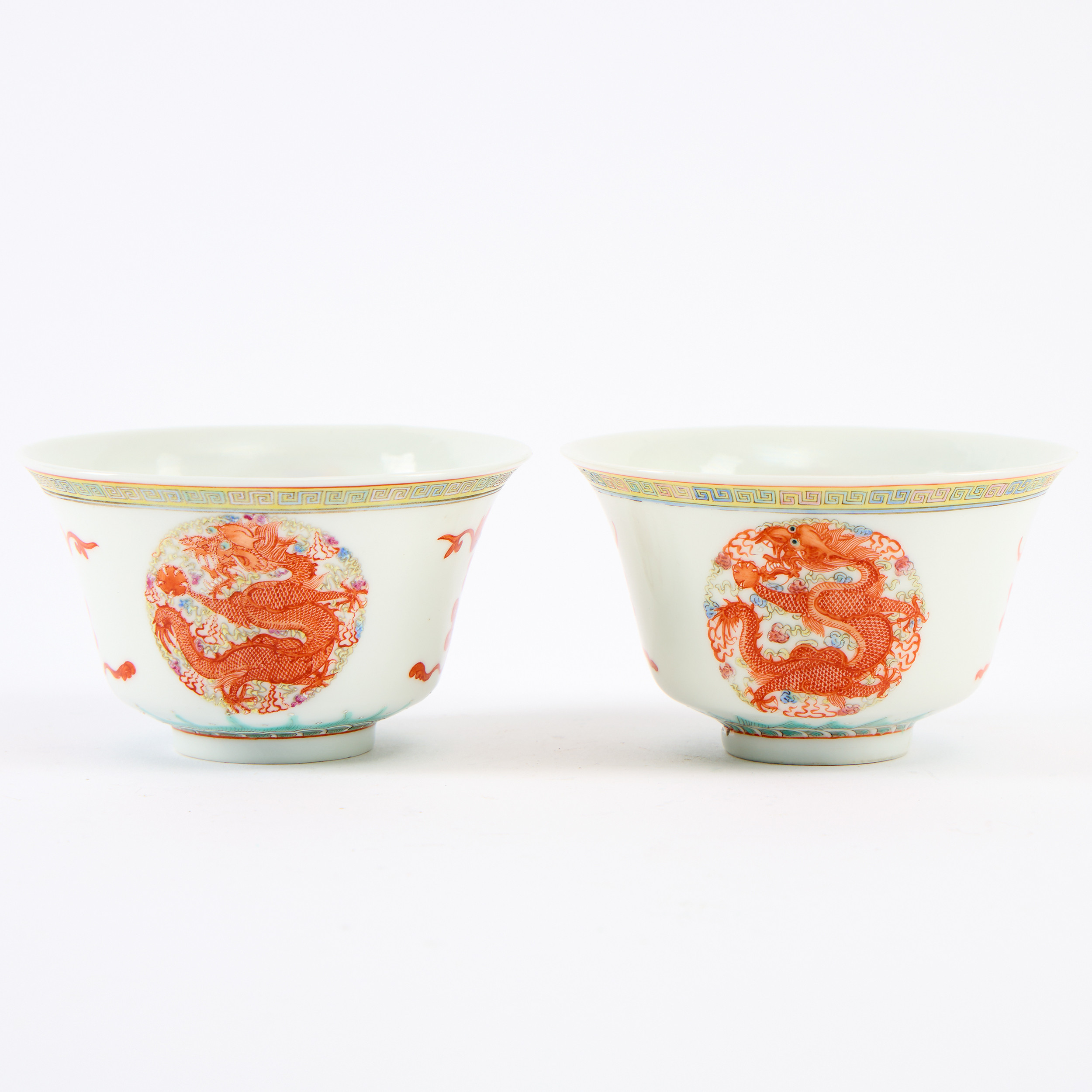 A Pair of Chinese Famille Rose Porcelain 'Dragon and Phoenix Roundel' Bowls.
