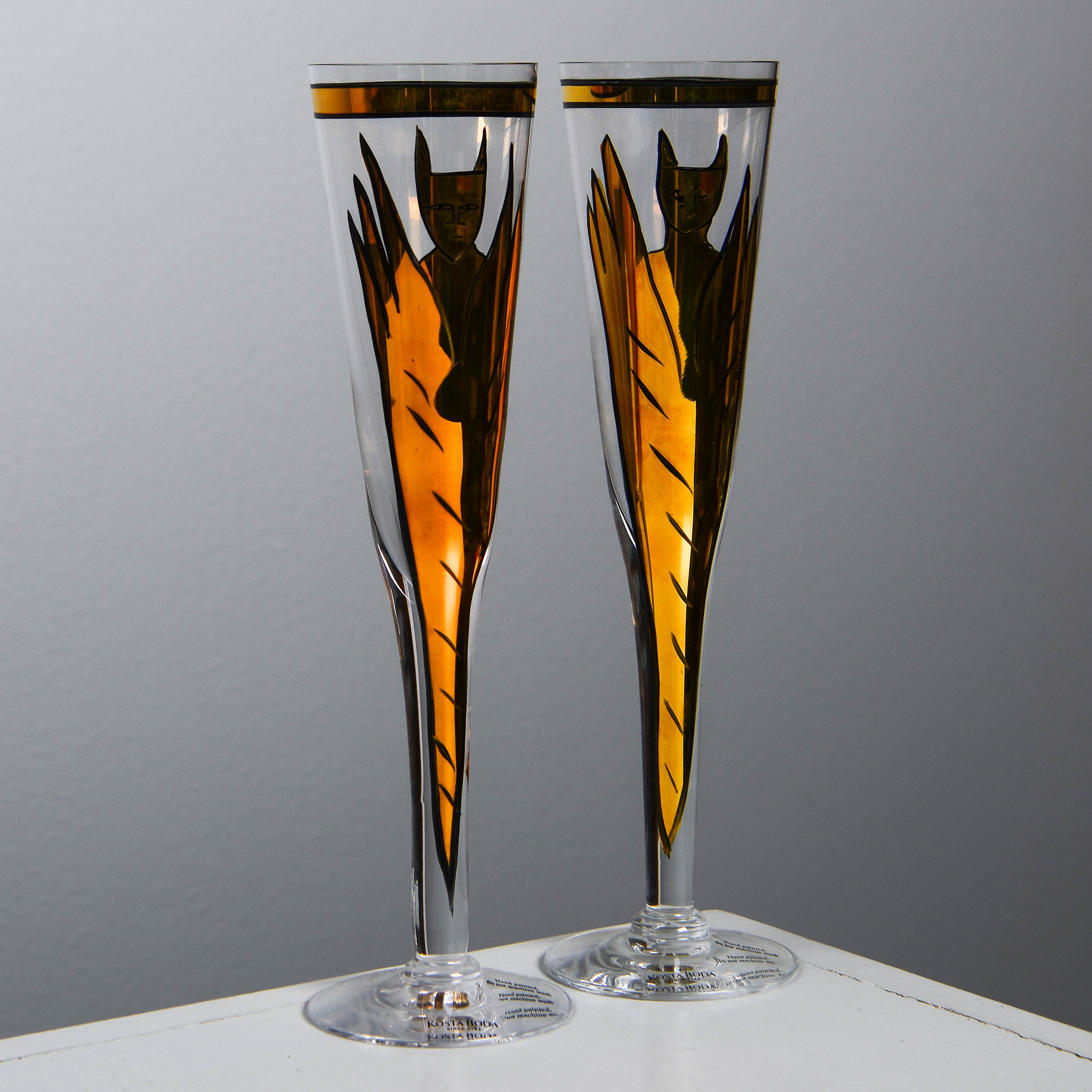 ULRICA HYDMAN-VALLIEN. Champagneglas, 2 st, "Goldie", Kosta Boda, signerade.