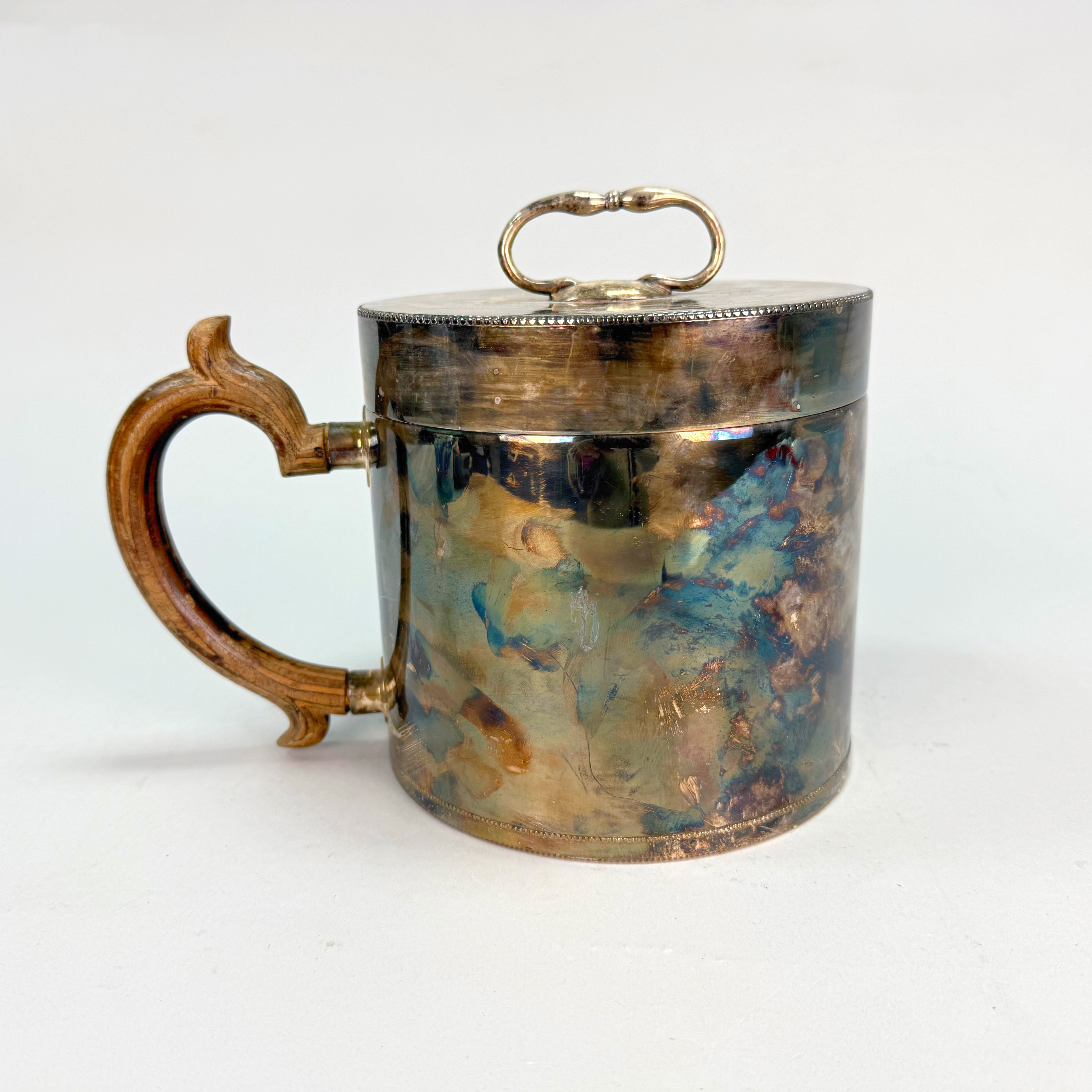 ISHINK, nysilver, handtag i skulpterat trä, insats i aluminum.