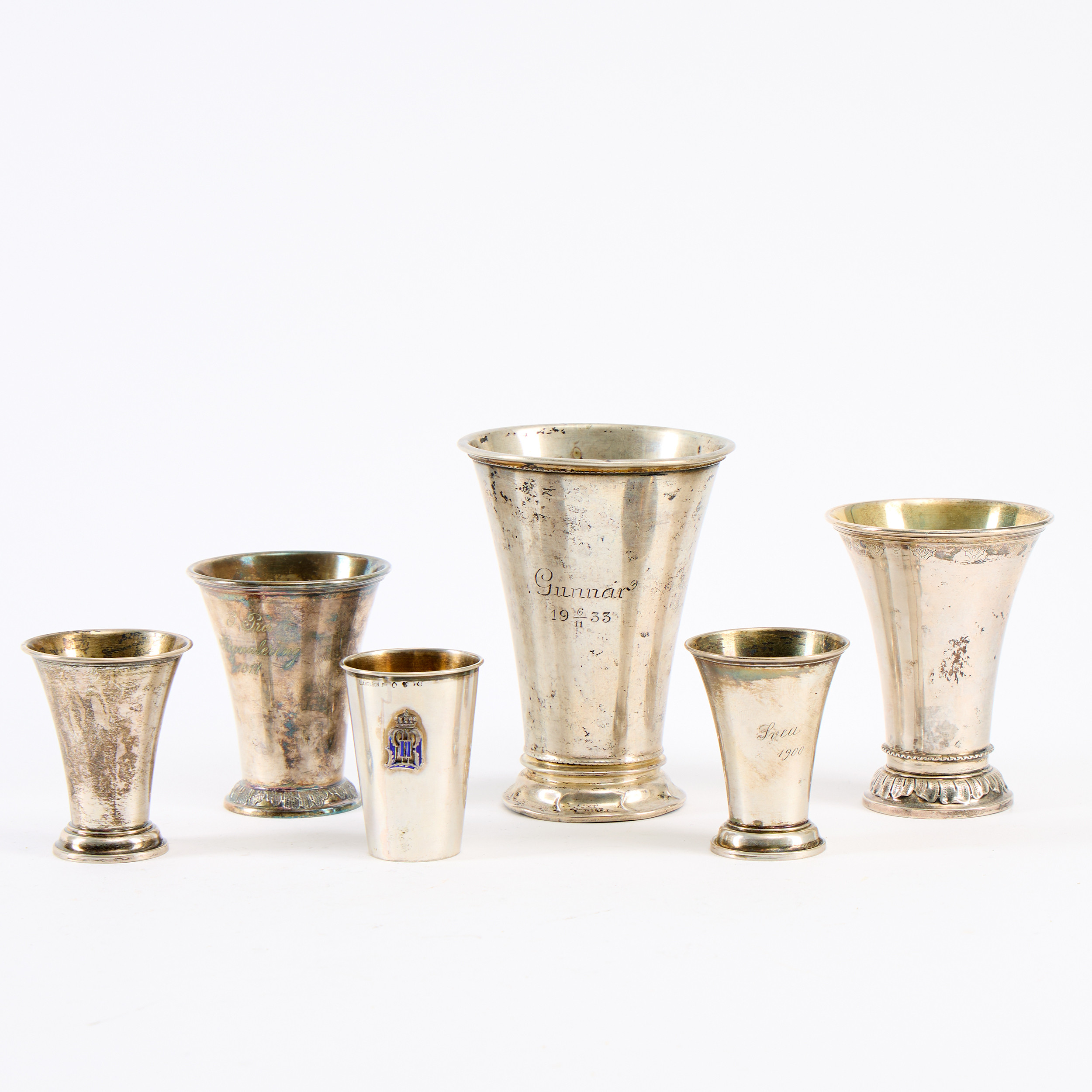 POKALER, 6 stycken, den största av K. Andersson, Stockholm. Silver, en av nysilver medföljer.