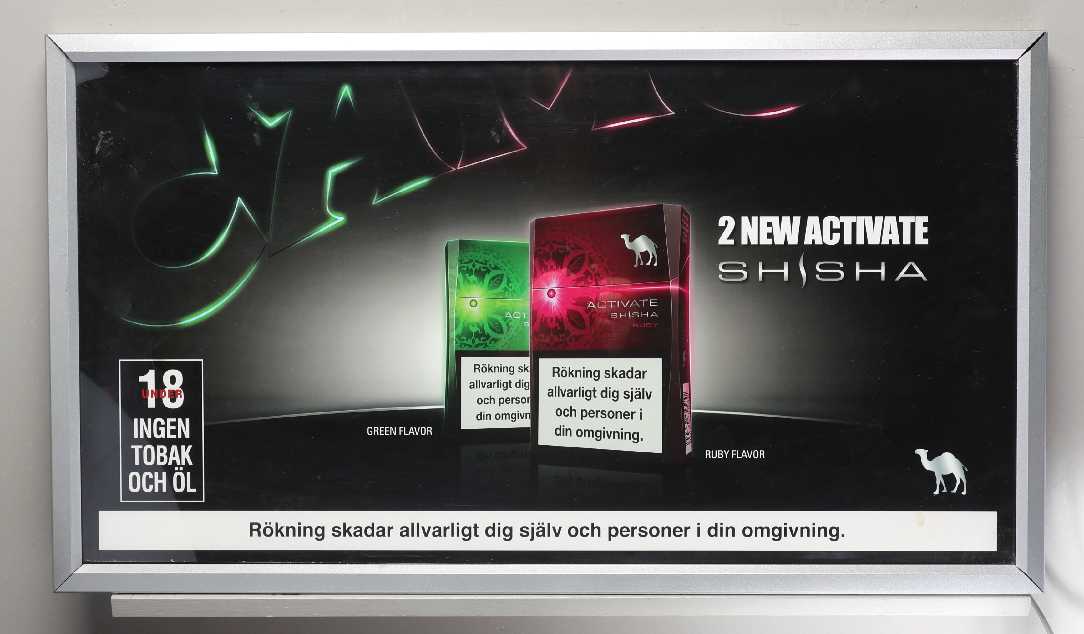 SKYLT. Reklamskylt "Camel" med belysning.