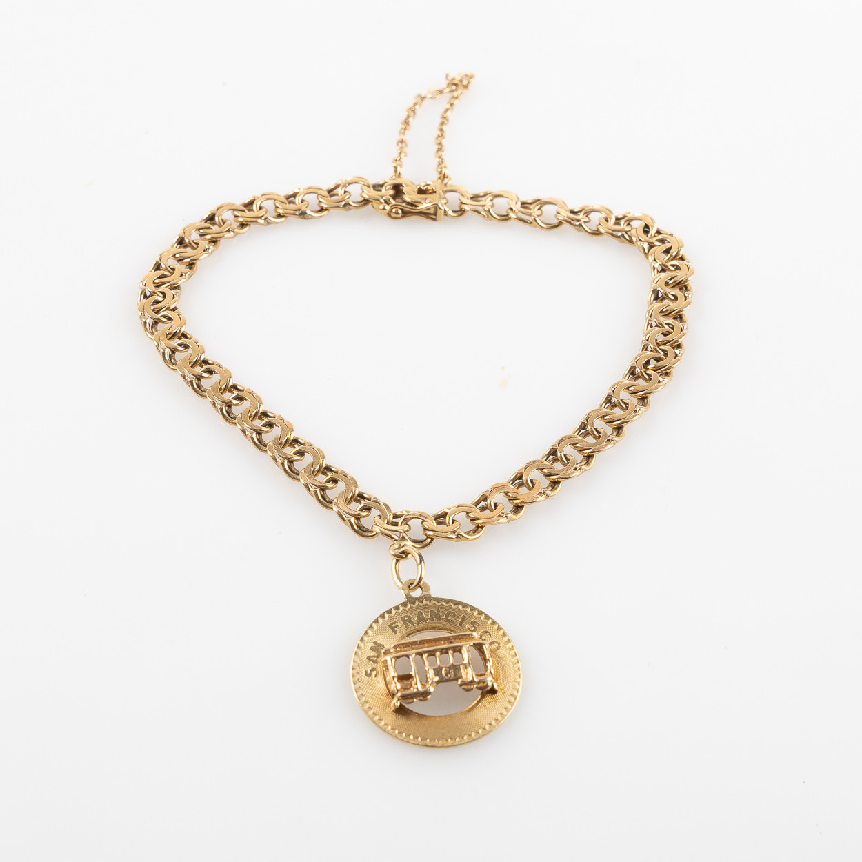 ARMLÄNK, 18K guld, berlock i 14K guld.