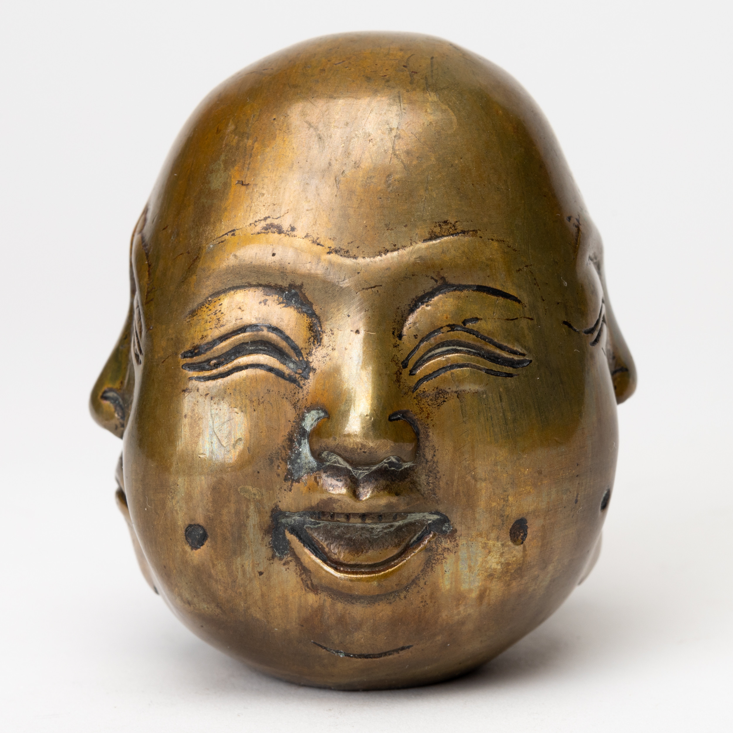 FIGURIN, Buddhas fyra ansikten, mässing, 1900-tal.