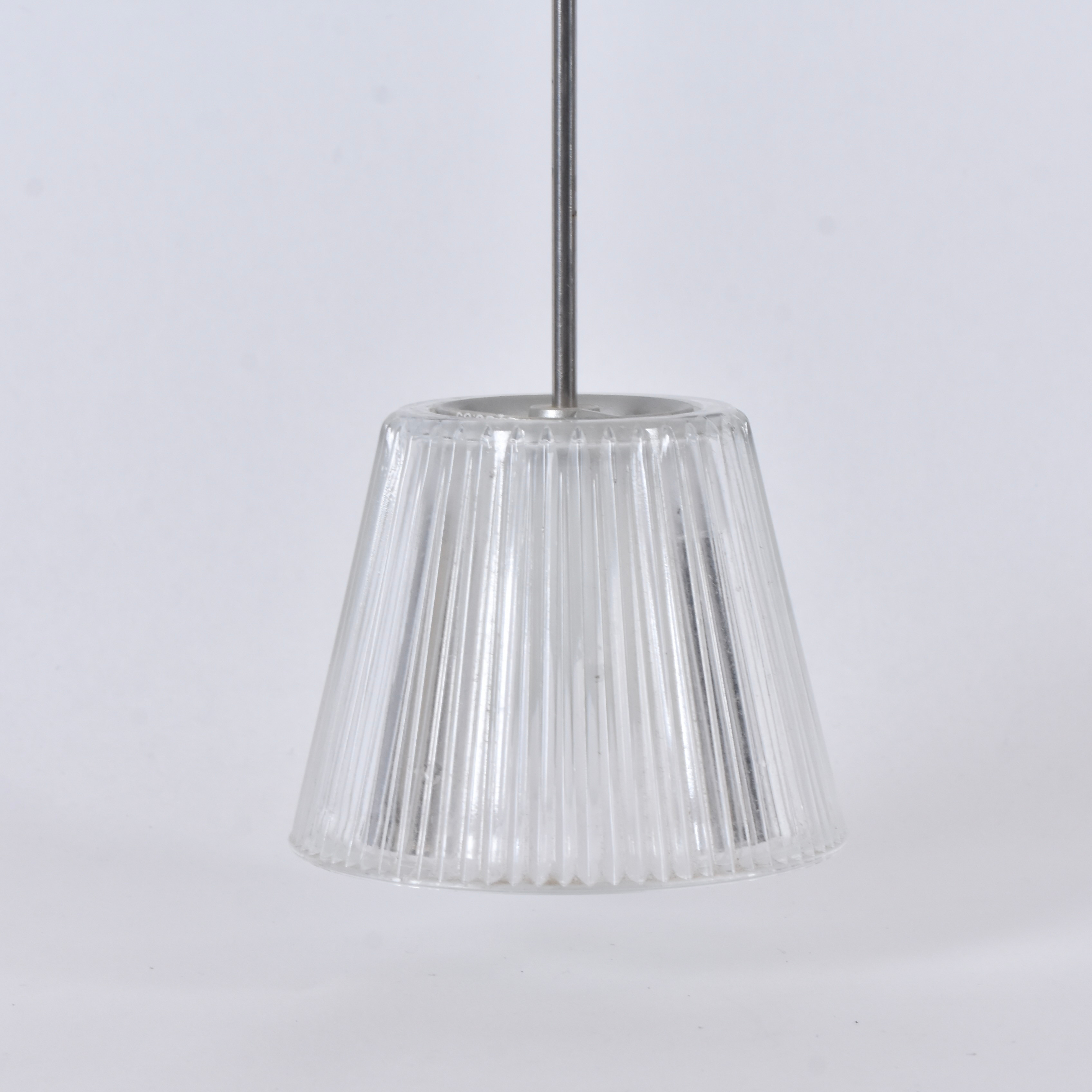 PHILIPPE STARK. Taklampa, "ROMEO BABE SUSPENSION", pressat glas och metall, för Flos, Italien.