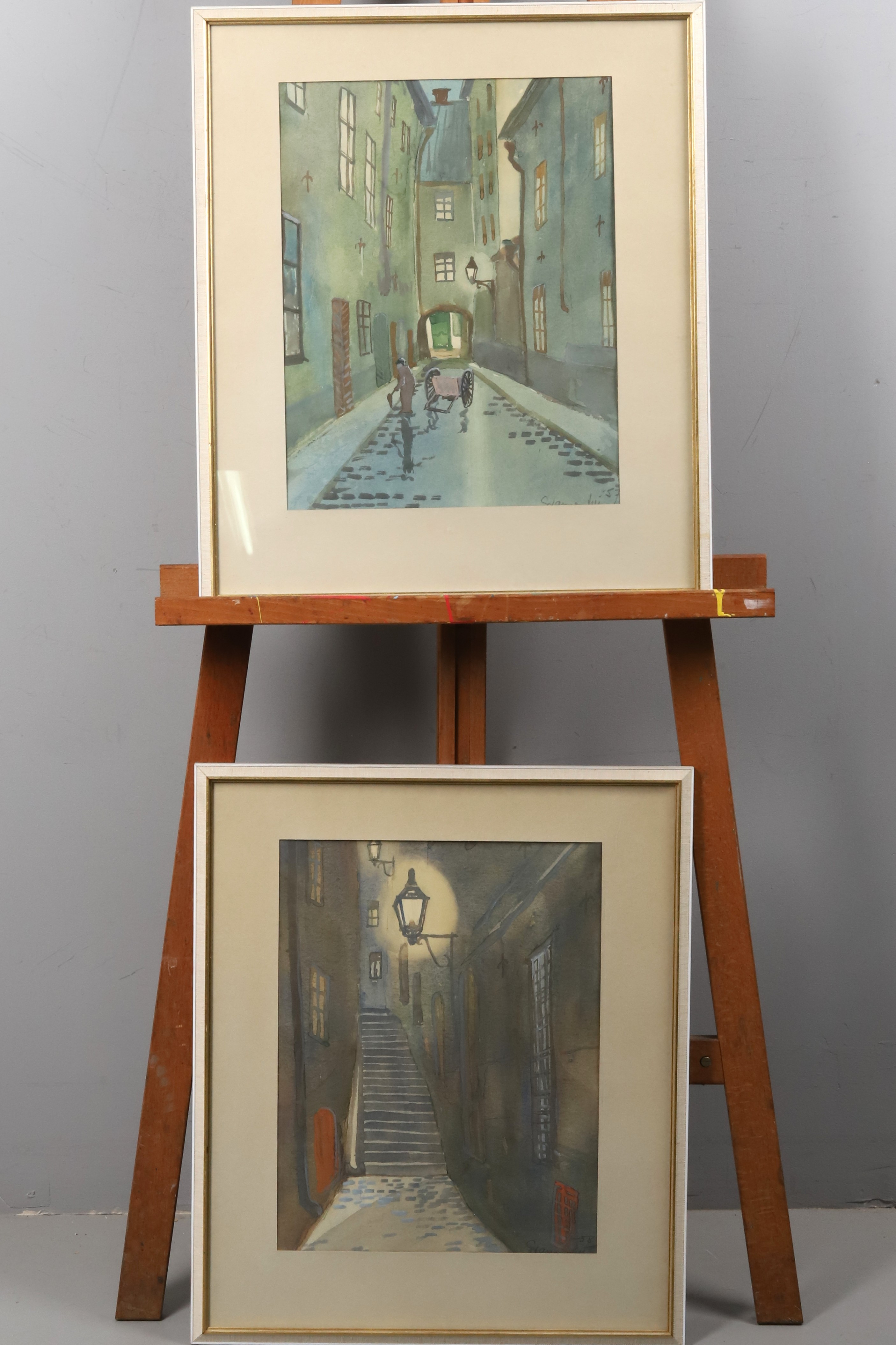 OIDENTIFIERAD KONSTNÄR. AKVARELLER, 2 st, motiv som liknar gamla stan, signerade och daterade -57 & 58.