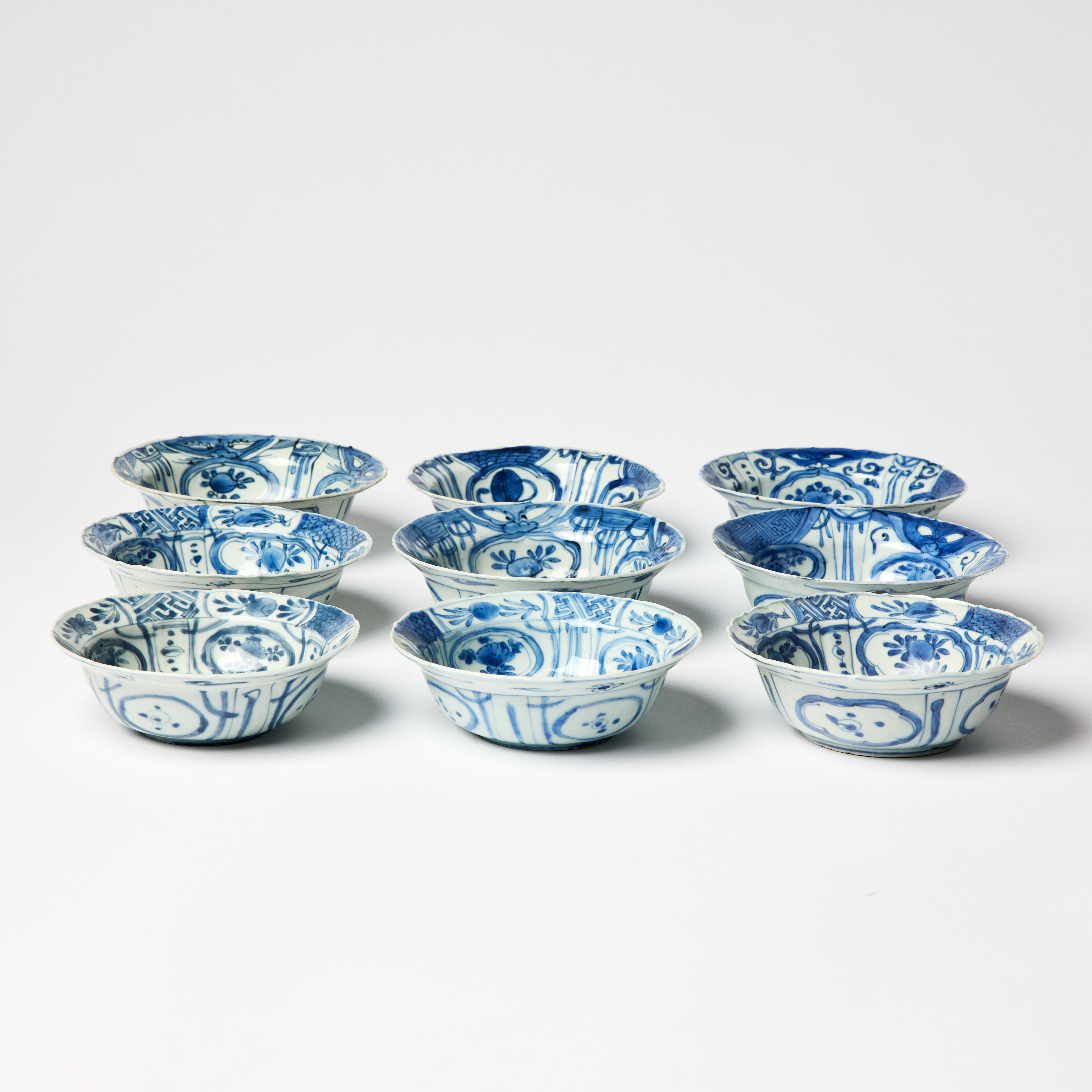 Nine Chinese Blue and White Moulded 'Kraak' Dessert Bowls.