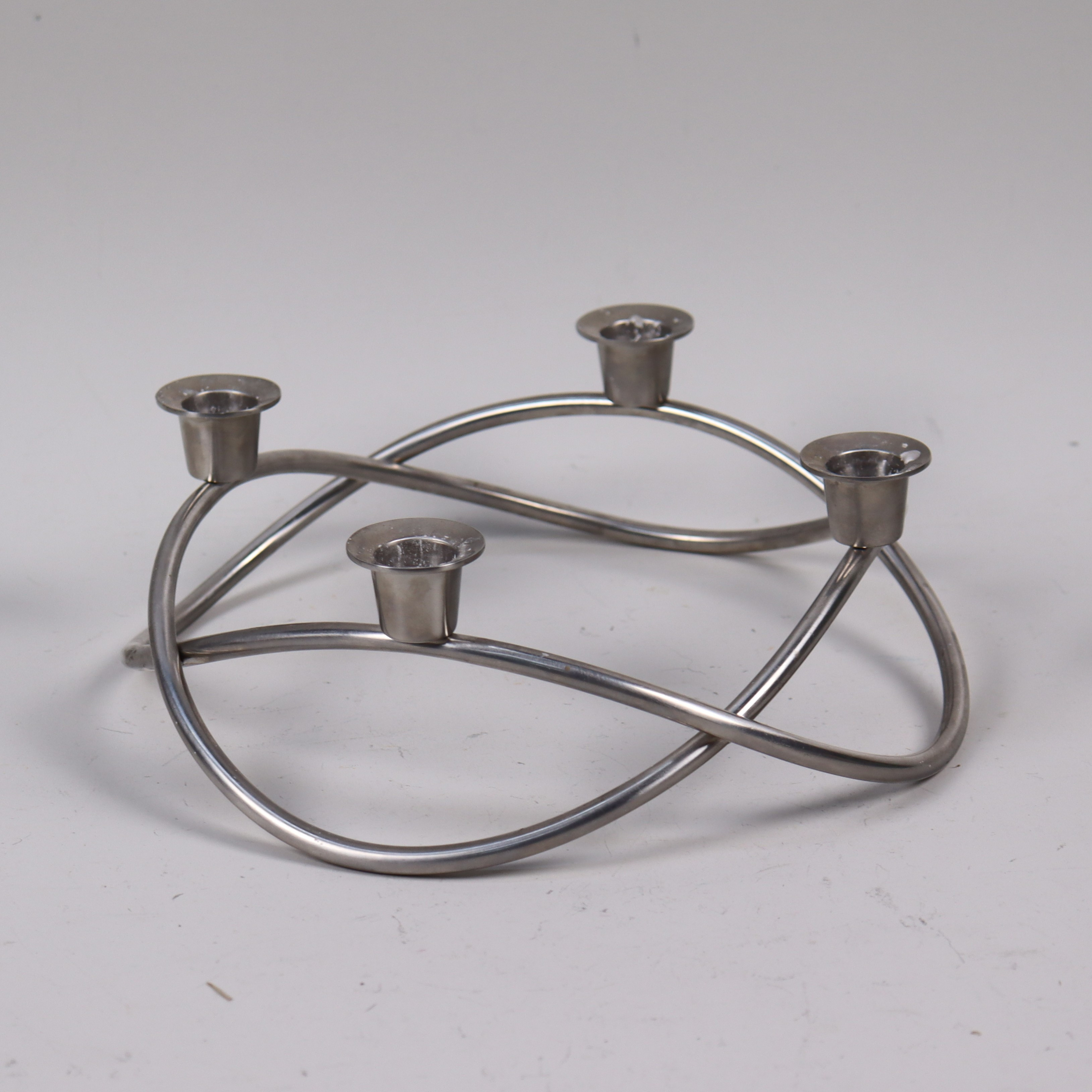 GEORG JENSEN. "Season", kandelaber i rostfritt stål, 4 ljushållare, design Maria Berntsen.