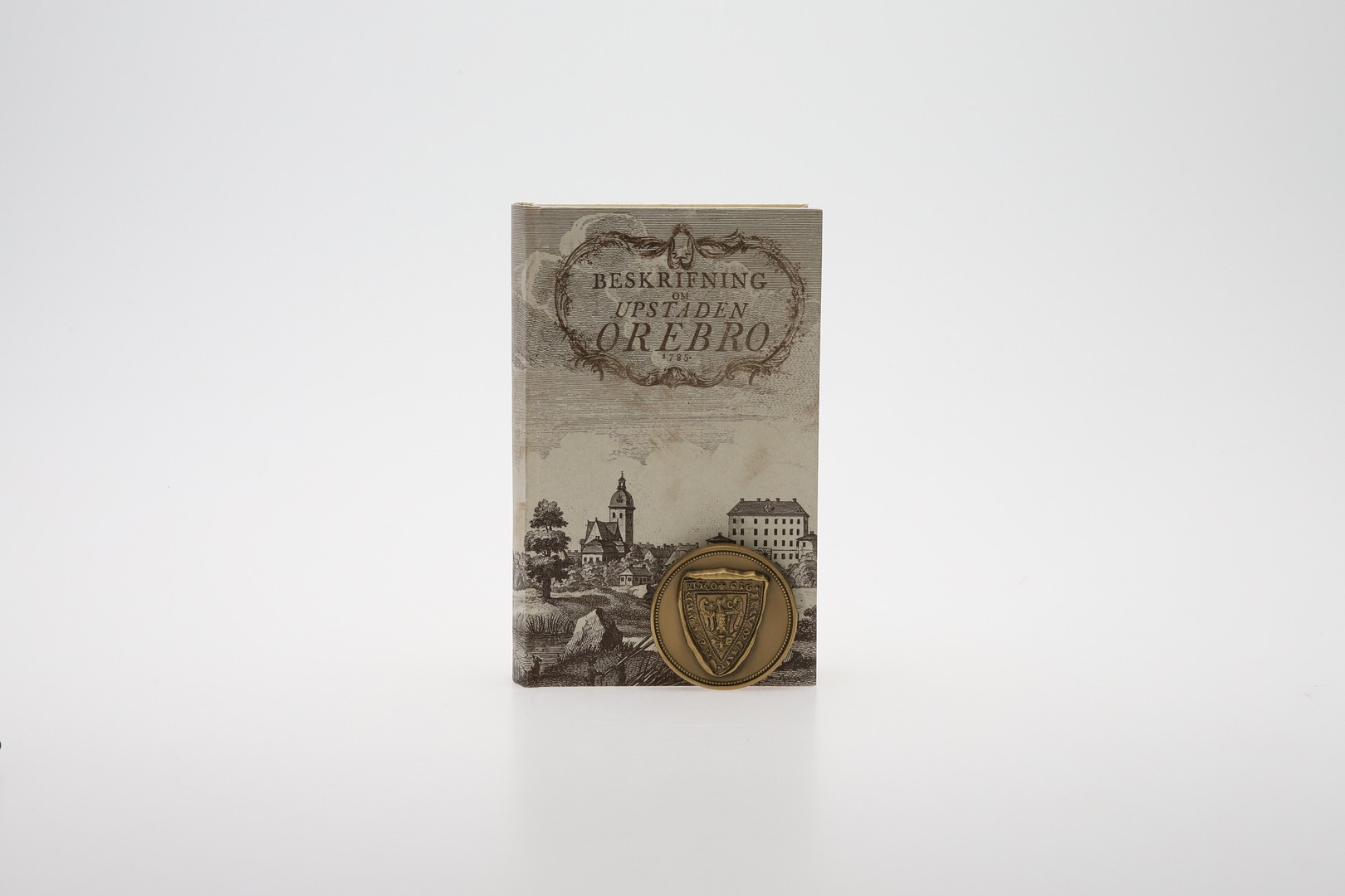 ÖREBRO MEMOREBILIA, 2 st, bok, Beskrifning om uppstaden Örebro, samt Stadssigill, faksimil.