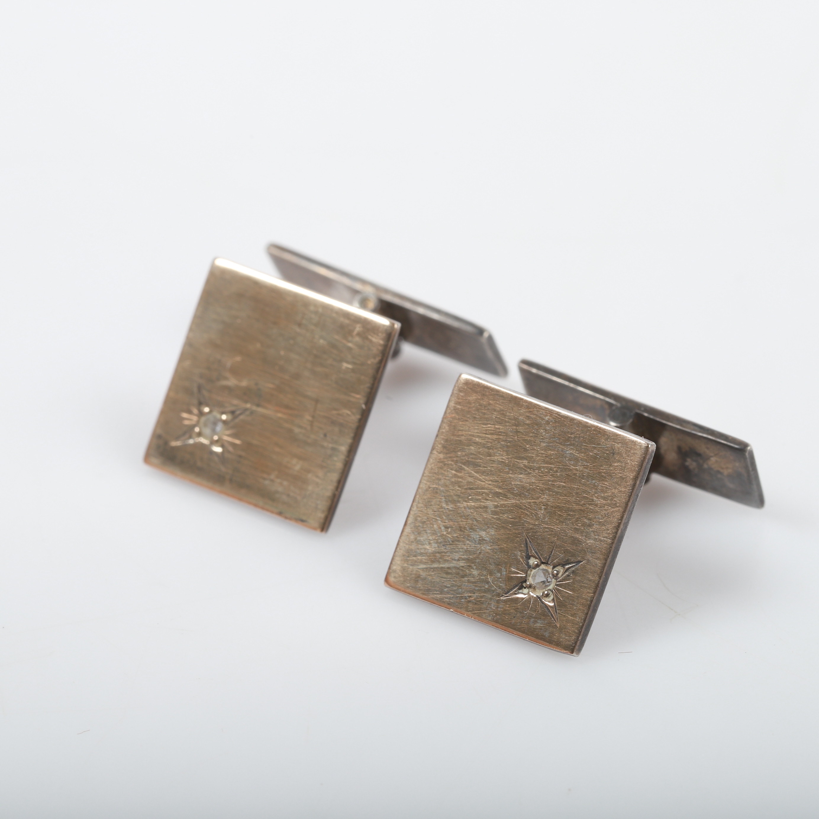 MANSCHETTKNAPPAR, 1 par, förgyllt silver med fasettslipade steanr, Alton, Falköping, 1969.