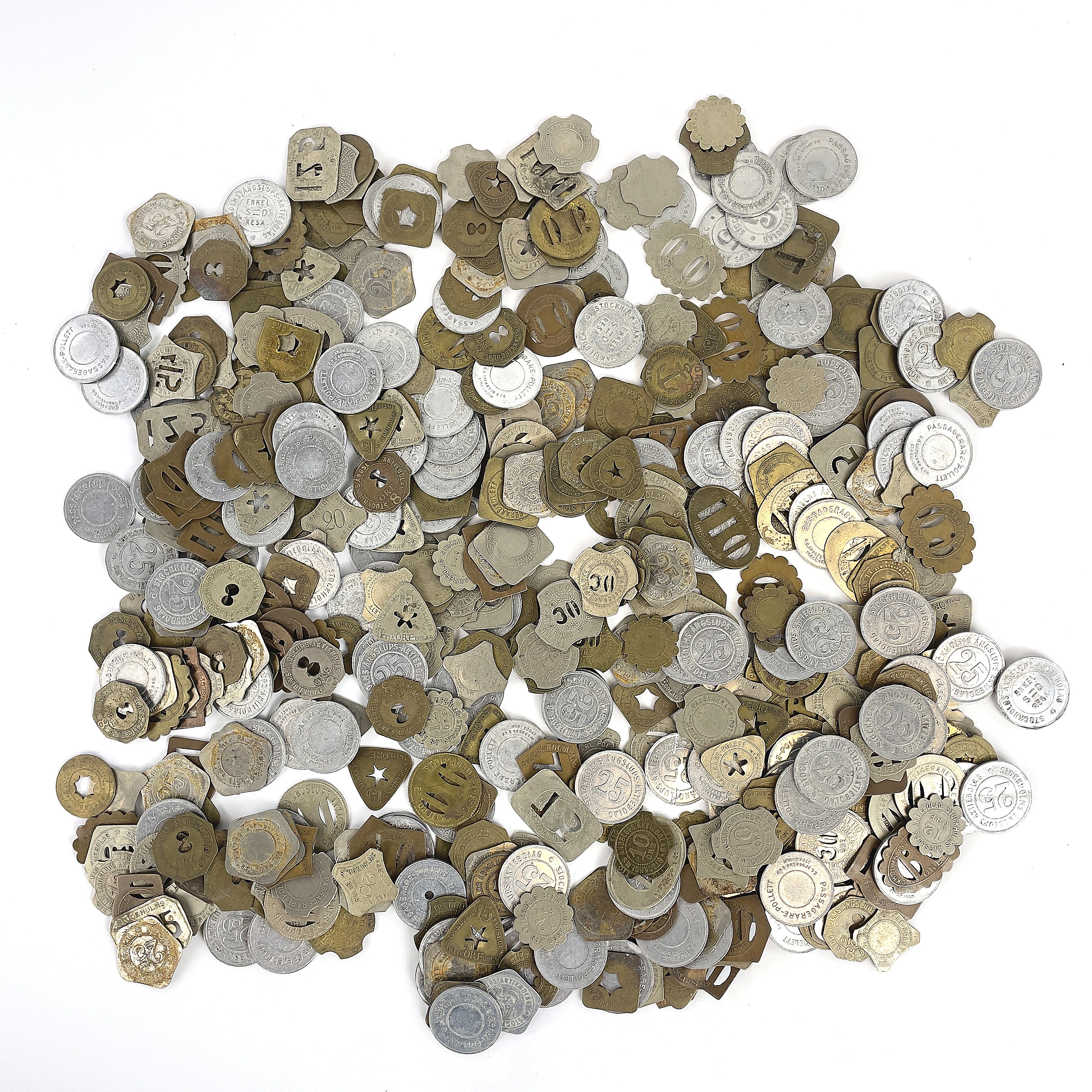 PARTI POLLETTER. Passagerare-polletter, bl.a. Stockholms Ångslups Aktiebolag, 1900-tal.