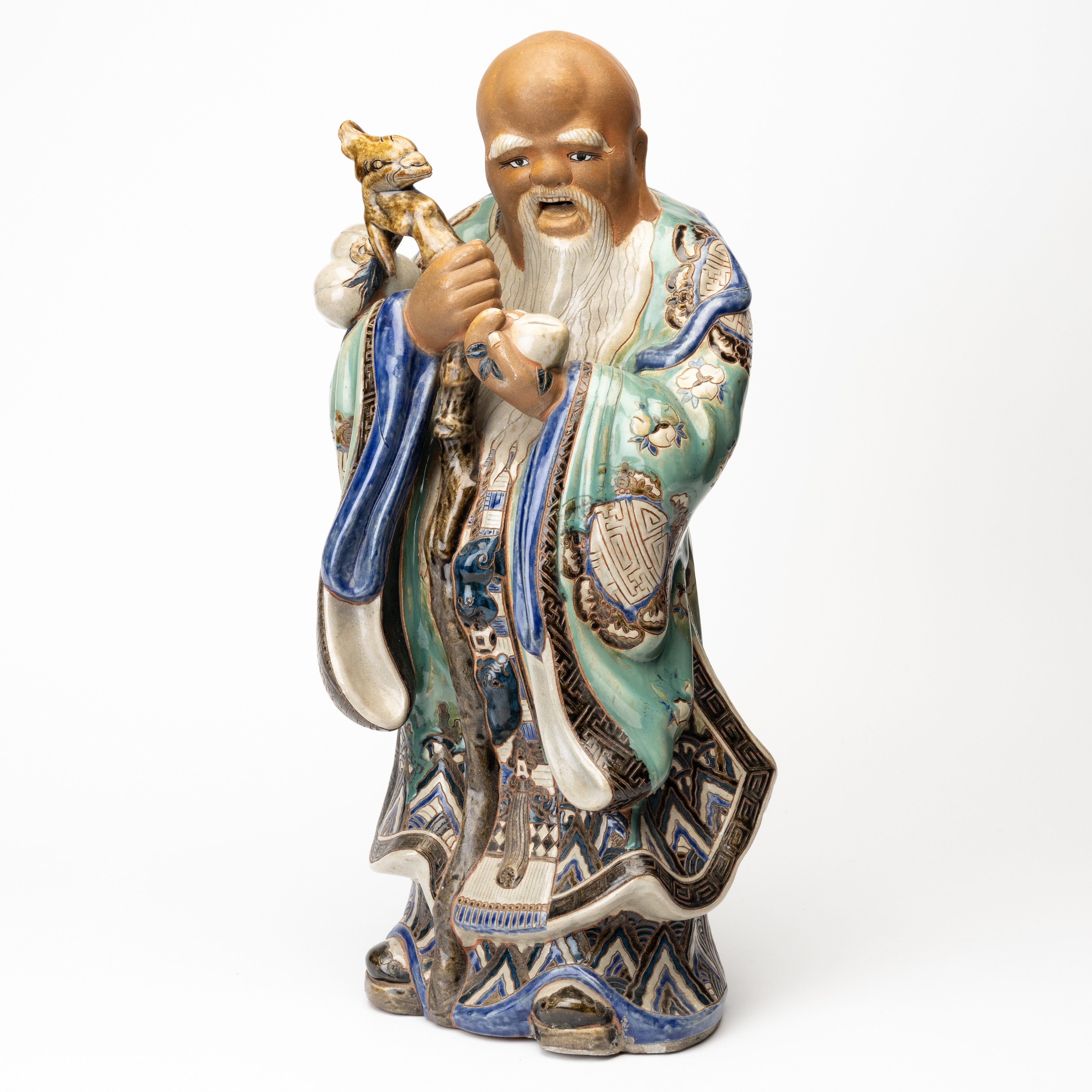 FIGURIN, Shoulao, delvis glaserad keramik, 1900-tal.