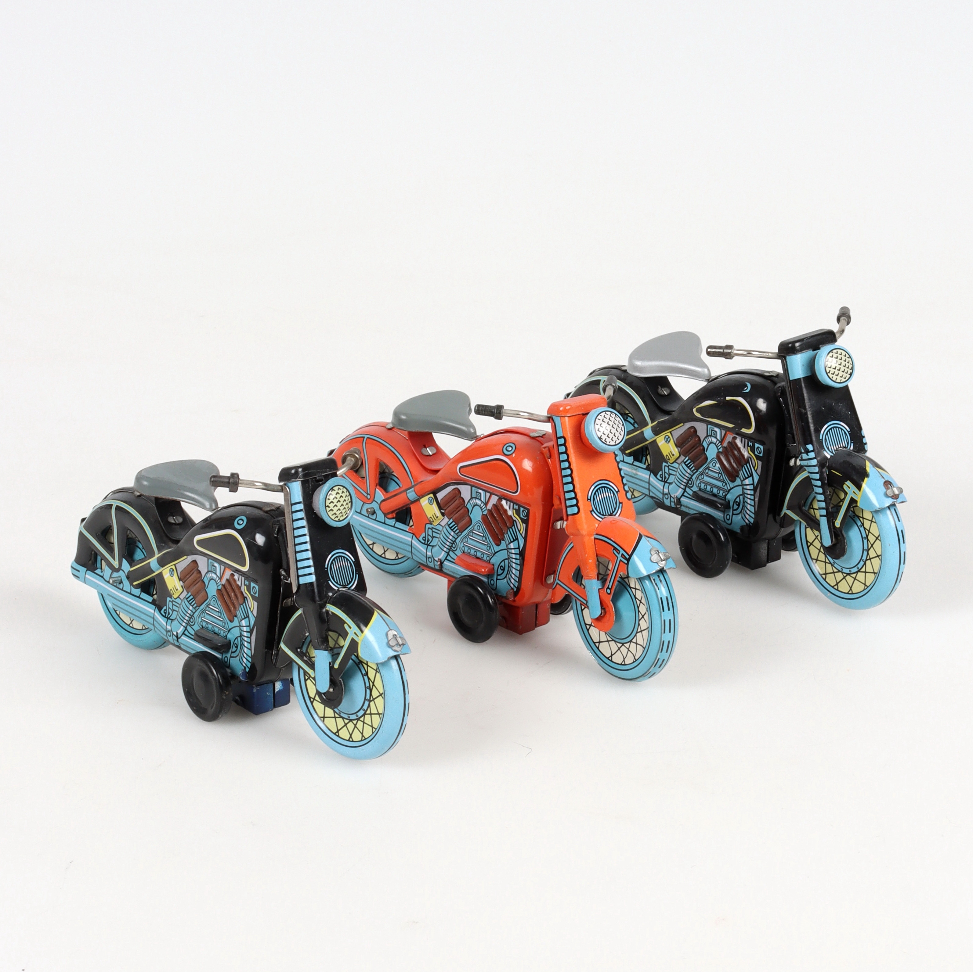 MOTORCYKLAR, 3 st, litograferad plåt, urverk, 19/2000-tal.