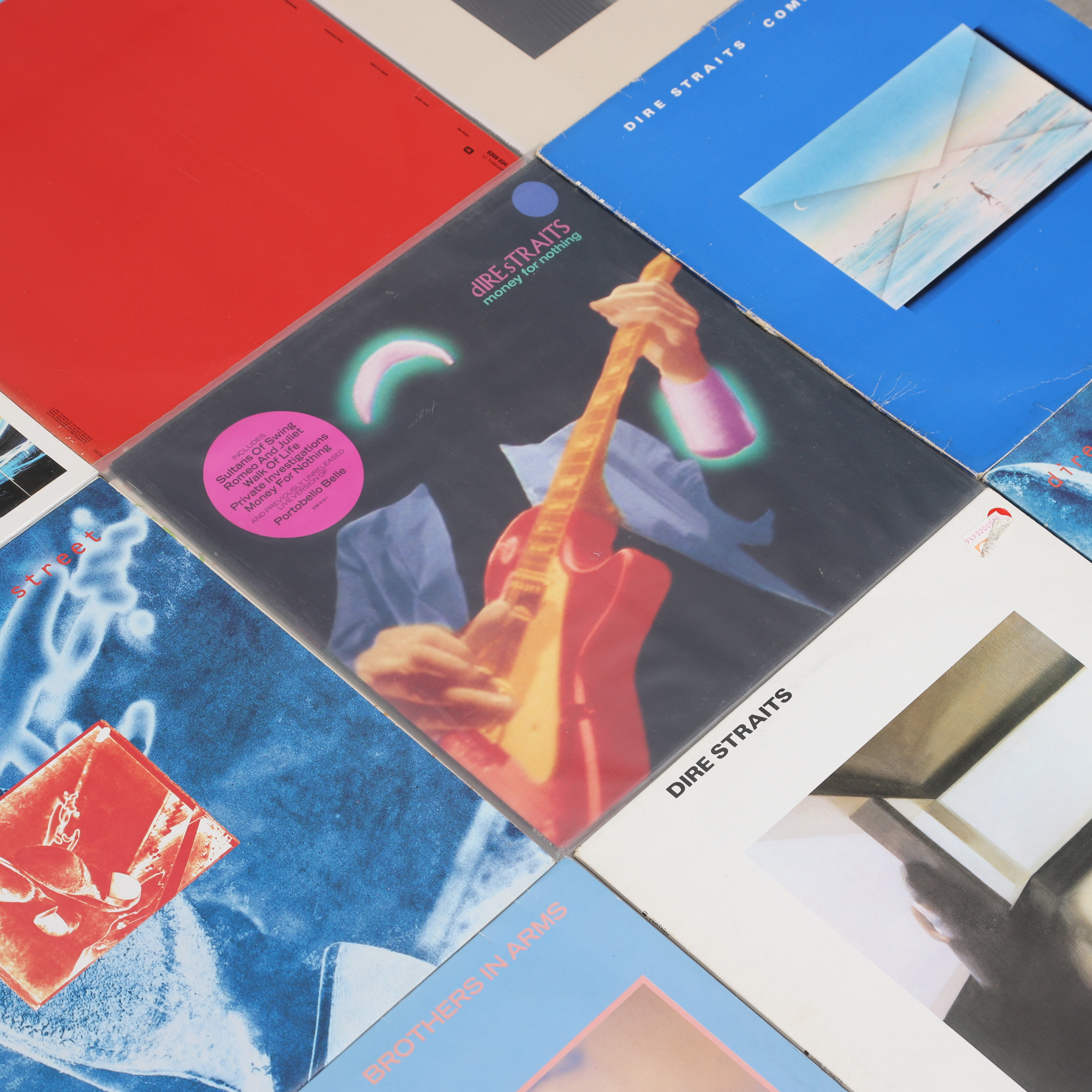 VINYLSKIVOR, 16 st, Dire Straits, b.la. "On every street"/"Alchemy".