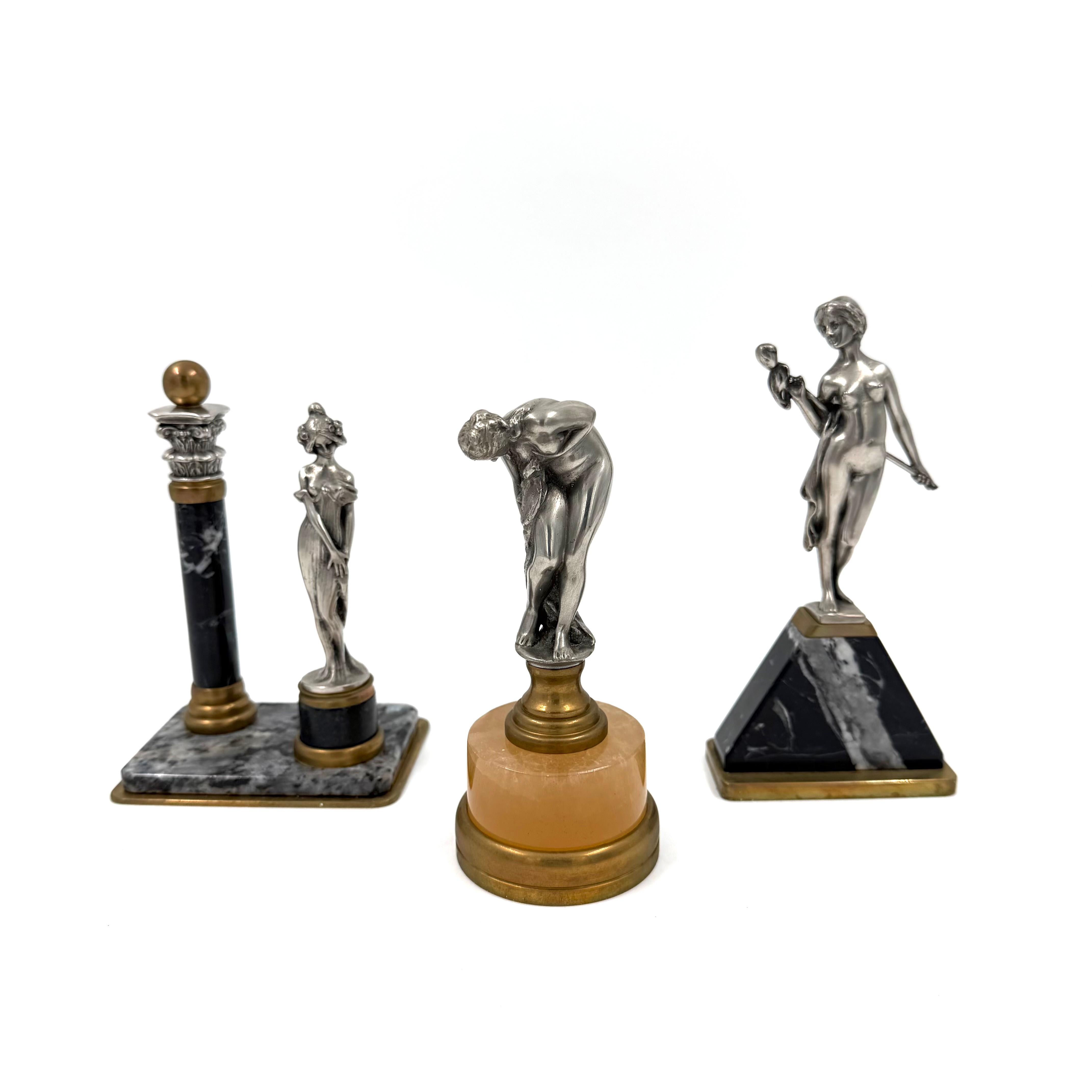 SKULPTURER, 3 st, jugendstil, 1900-tal, metall, socklar av sten/ mässing.