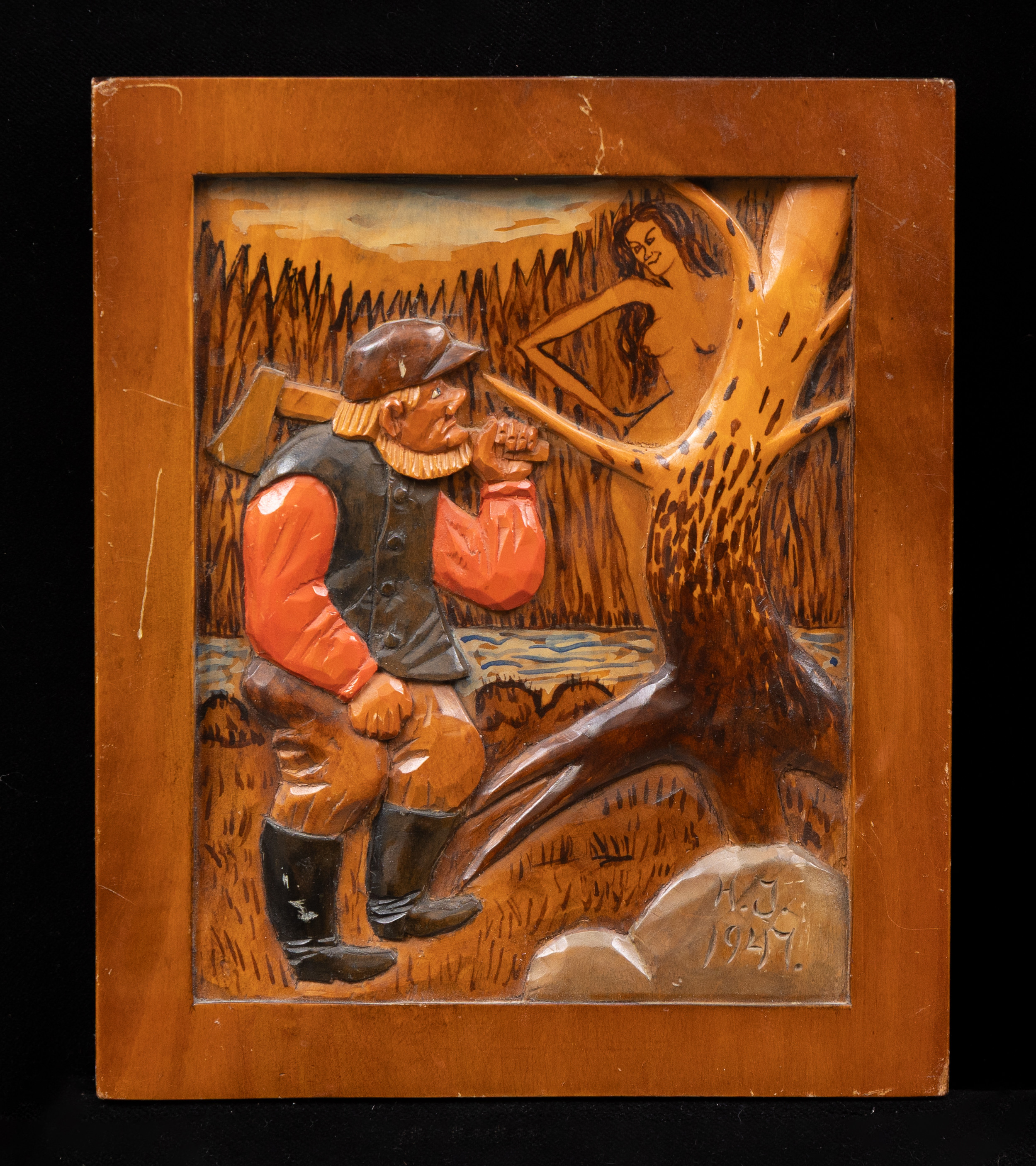 RELIEFER 3 st, i delvis memålade trä, signerade.