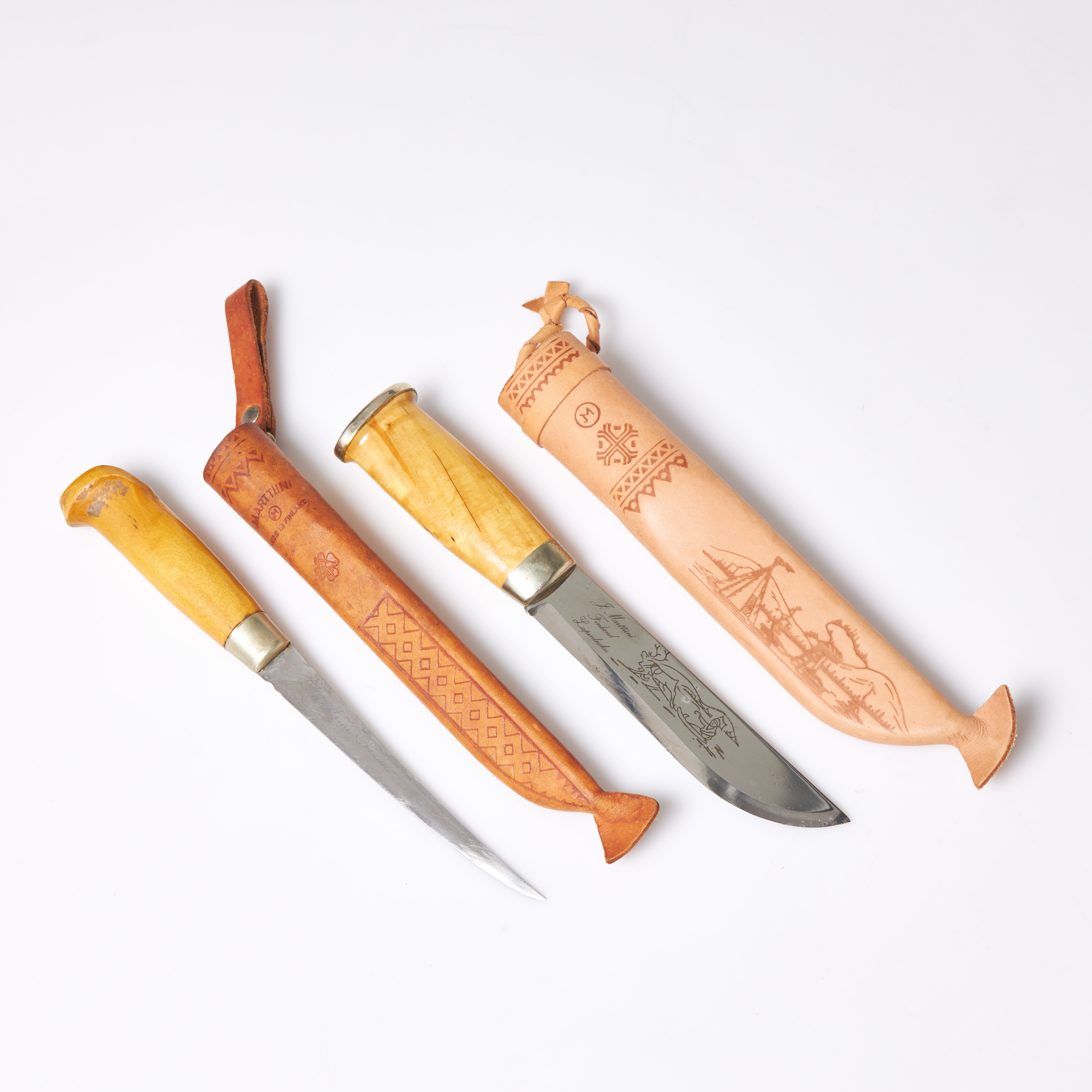 KNIVAR, 2 st, Janne Marttiini, Finland, blad av stål märkta J Marttiini, Finland.
