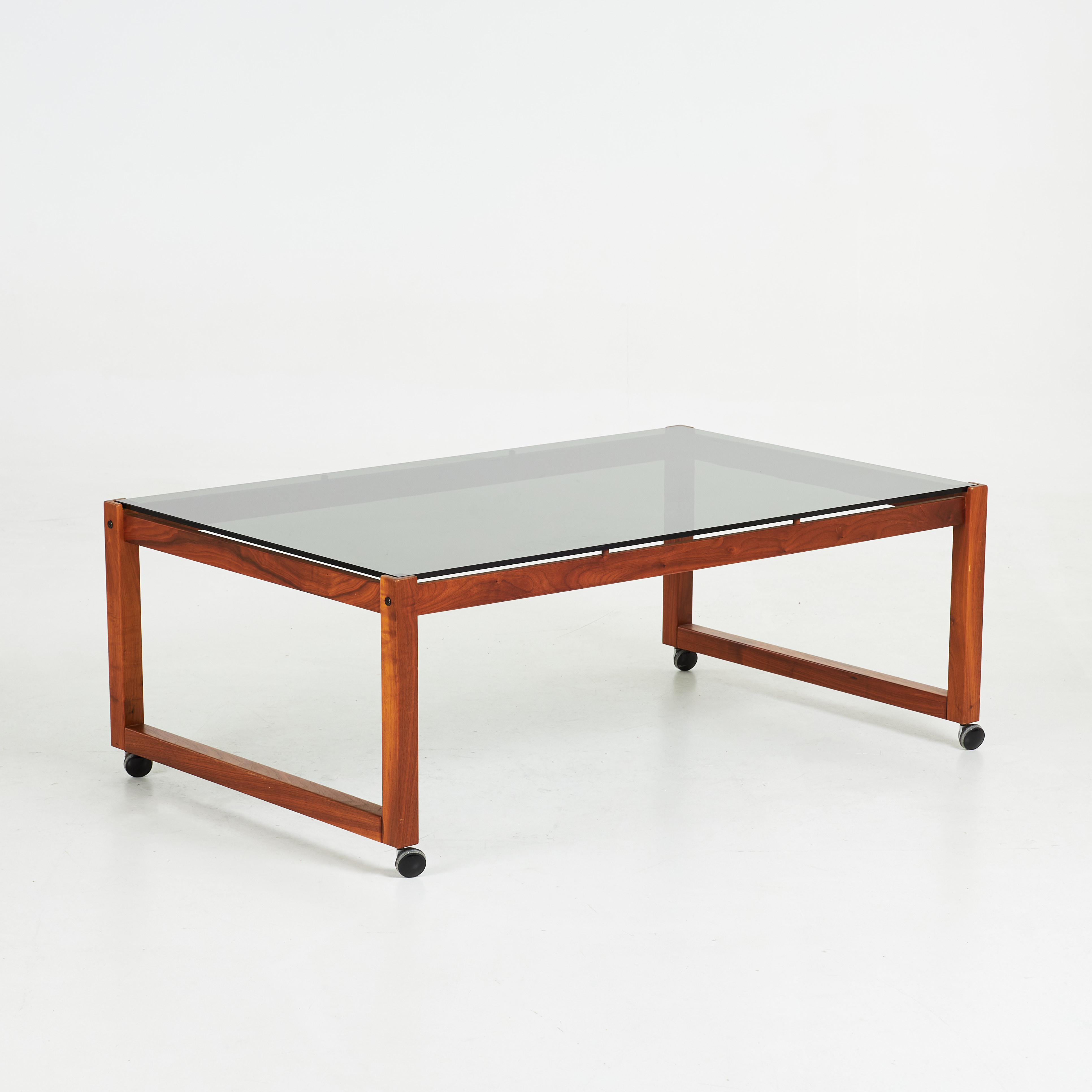 SOFFBORD, 1960-70-tal, stomme i valnöt, tonad glasskiva, på hjul.