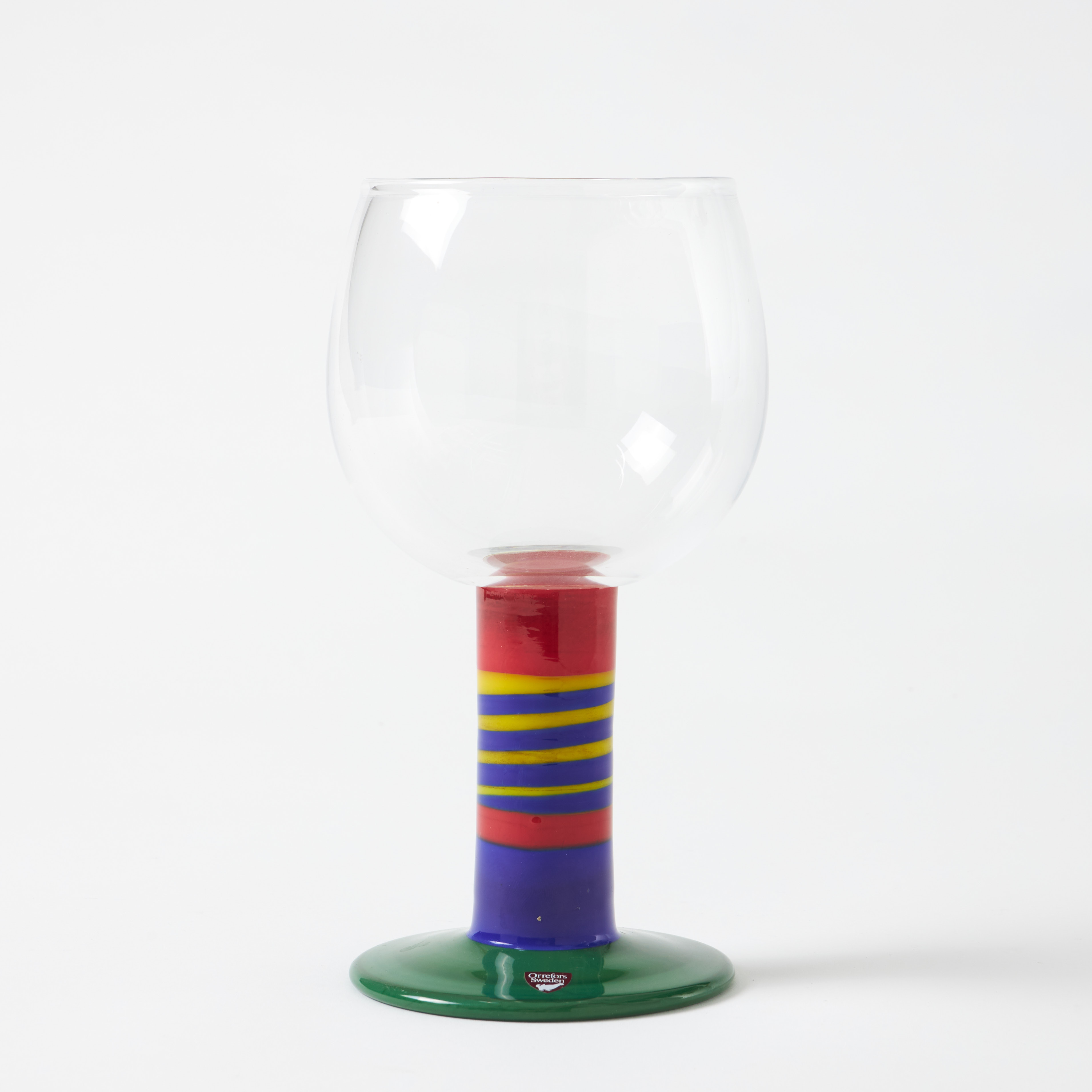 GUNNAR CYRÉN. "Popglas", Orrefors, massivt skaft med randdekor i polykroma färger, märkt.