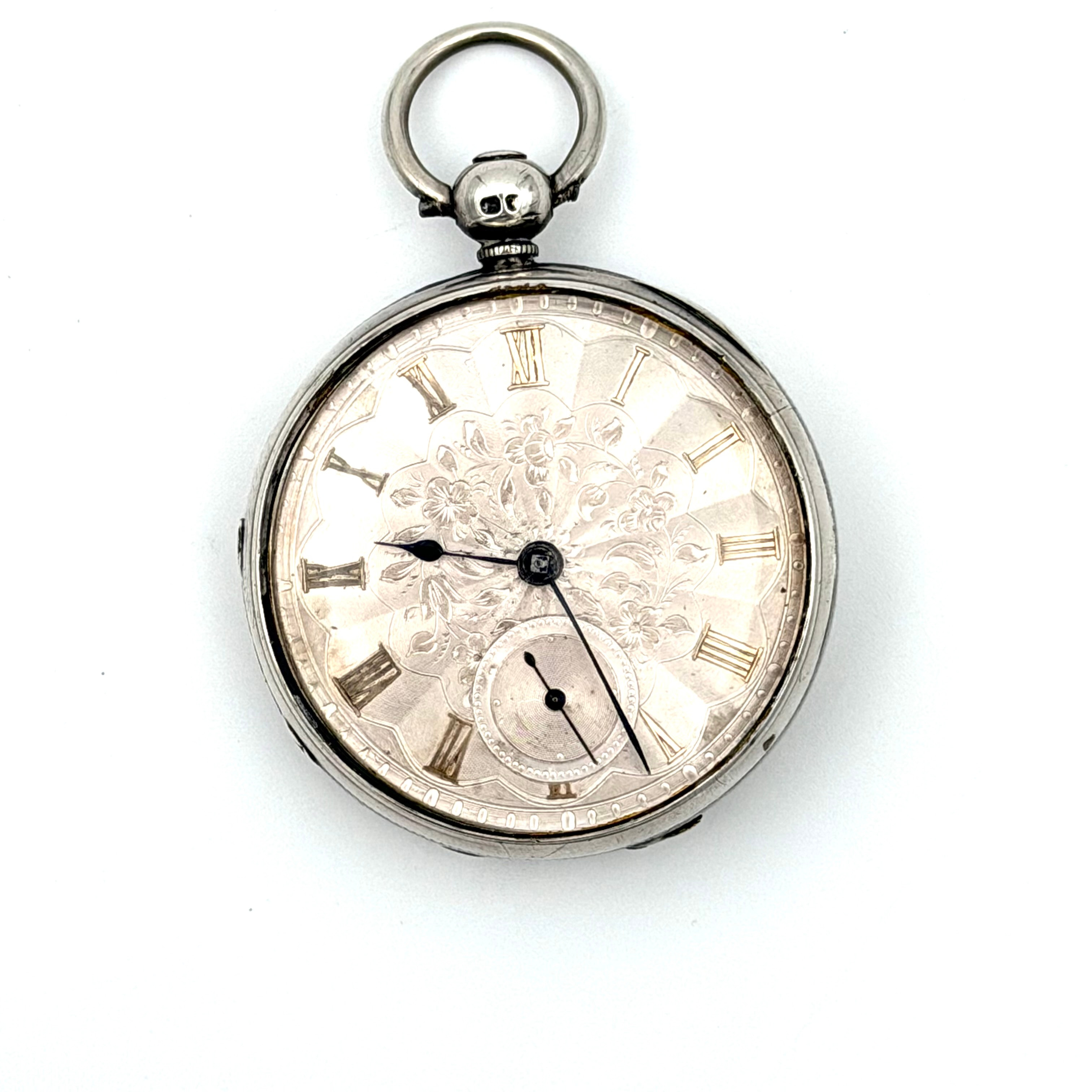 JOHN STANILAND, Fickur, England, nyckeldragare, subsekund, boett och innerboett i silver/925, baksida med engine turned dekorgravyr, kontrollstämpel med årsindex för London 1846, urtavla med romerska siffror, blånerade visare.