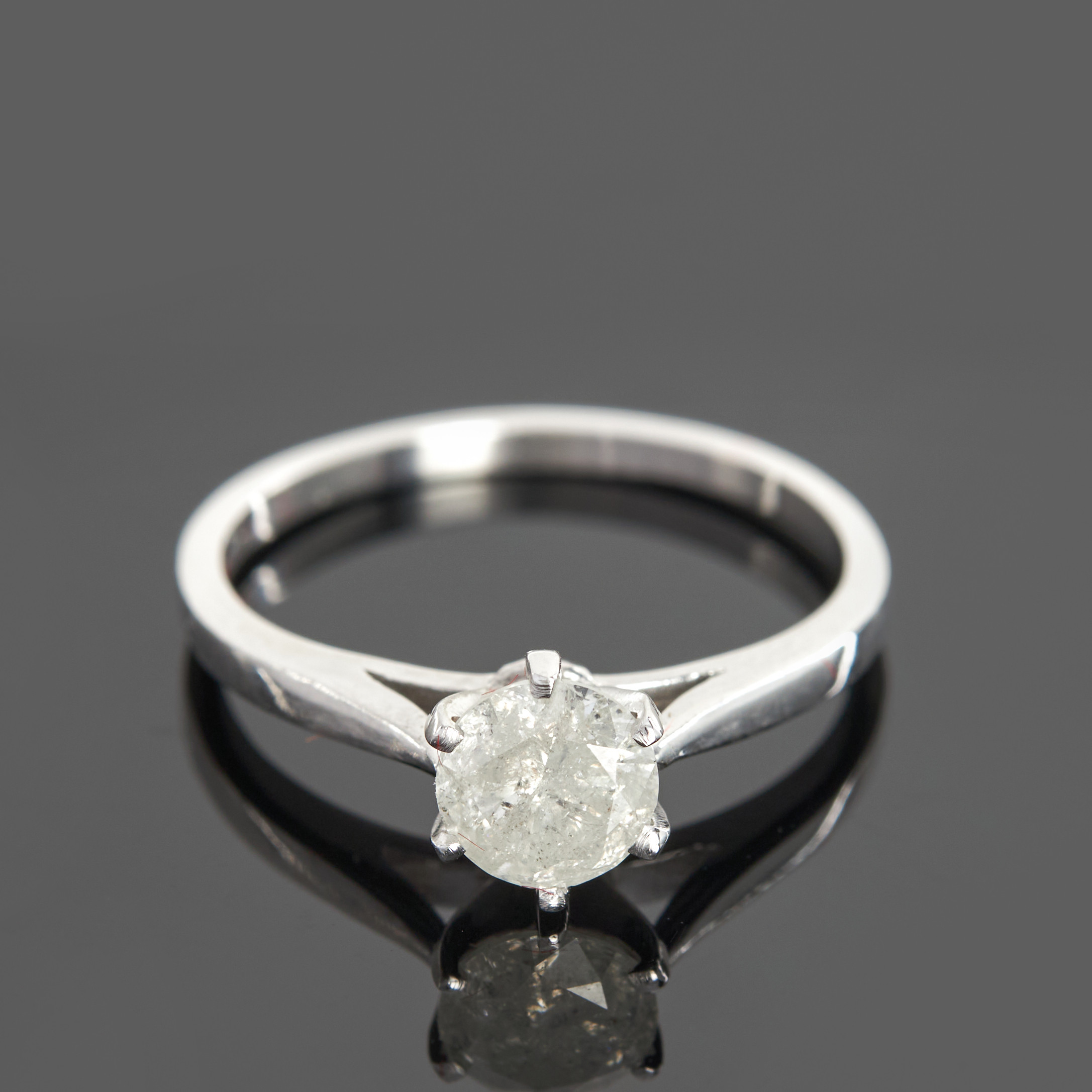 ENSTENSRING, 14k vitguld med en briljantslipad diamant 0.72ct.