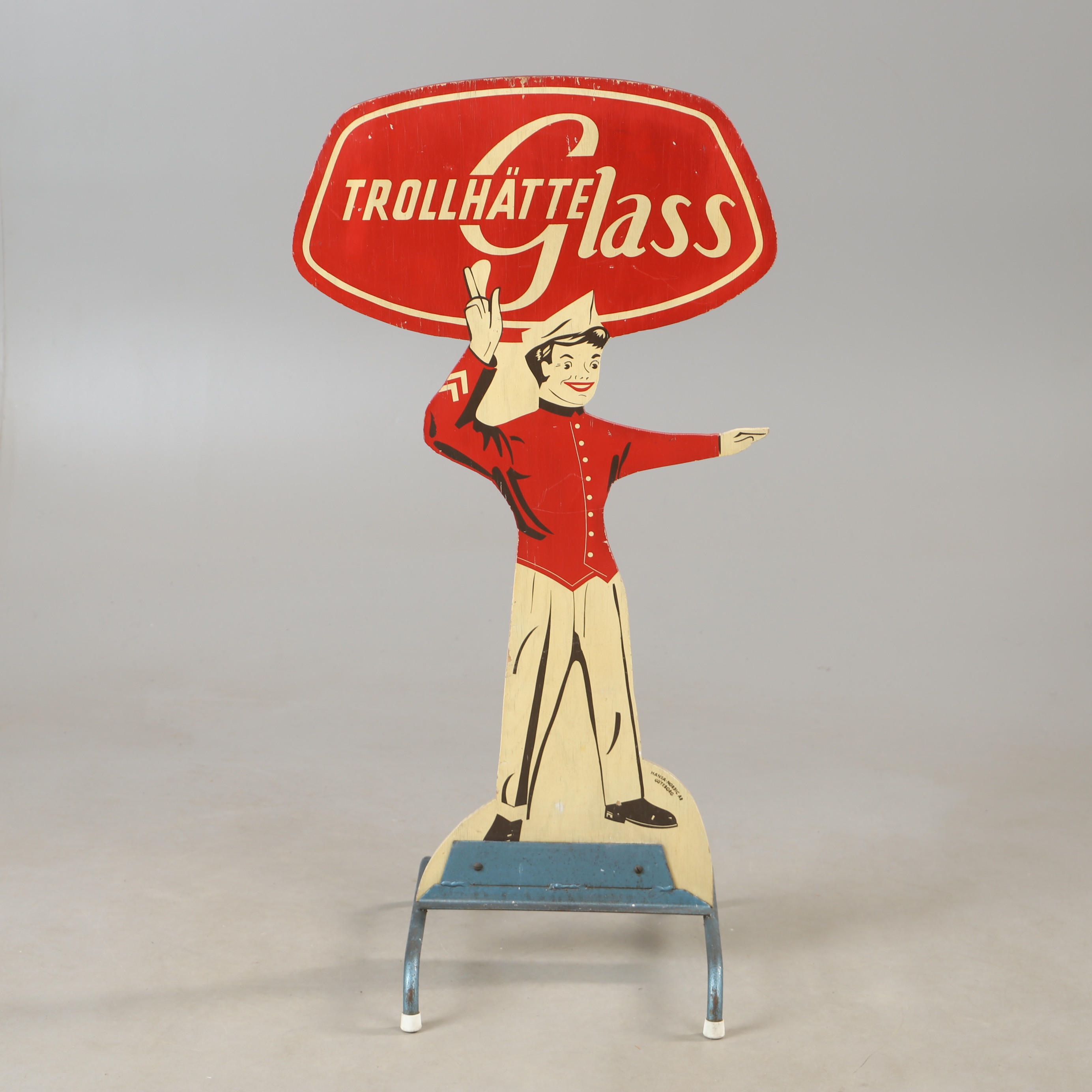 REKLAMSKYLT, målat trä på metallunderede, Trollehätte glass, Hansa-nordic AB Göteborg, 1900-talets mitt.