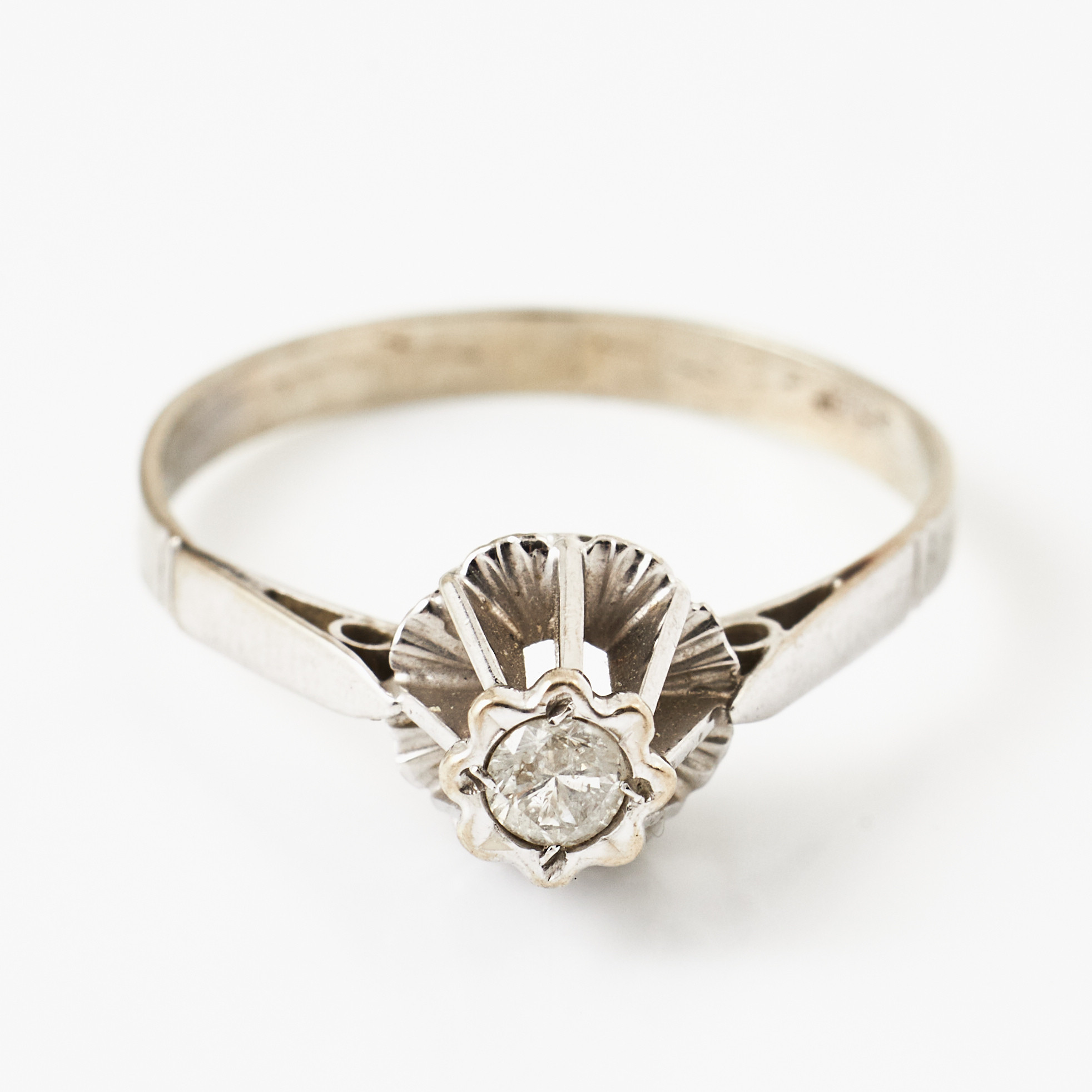 RING, 14 k rodierat vitguld, briljant ca 0,10 ct.