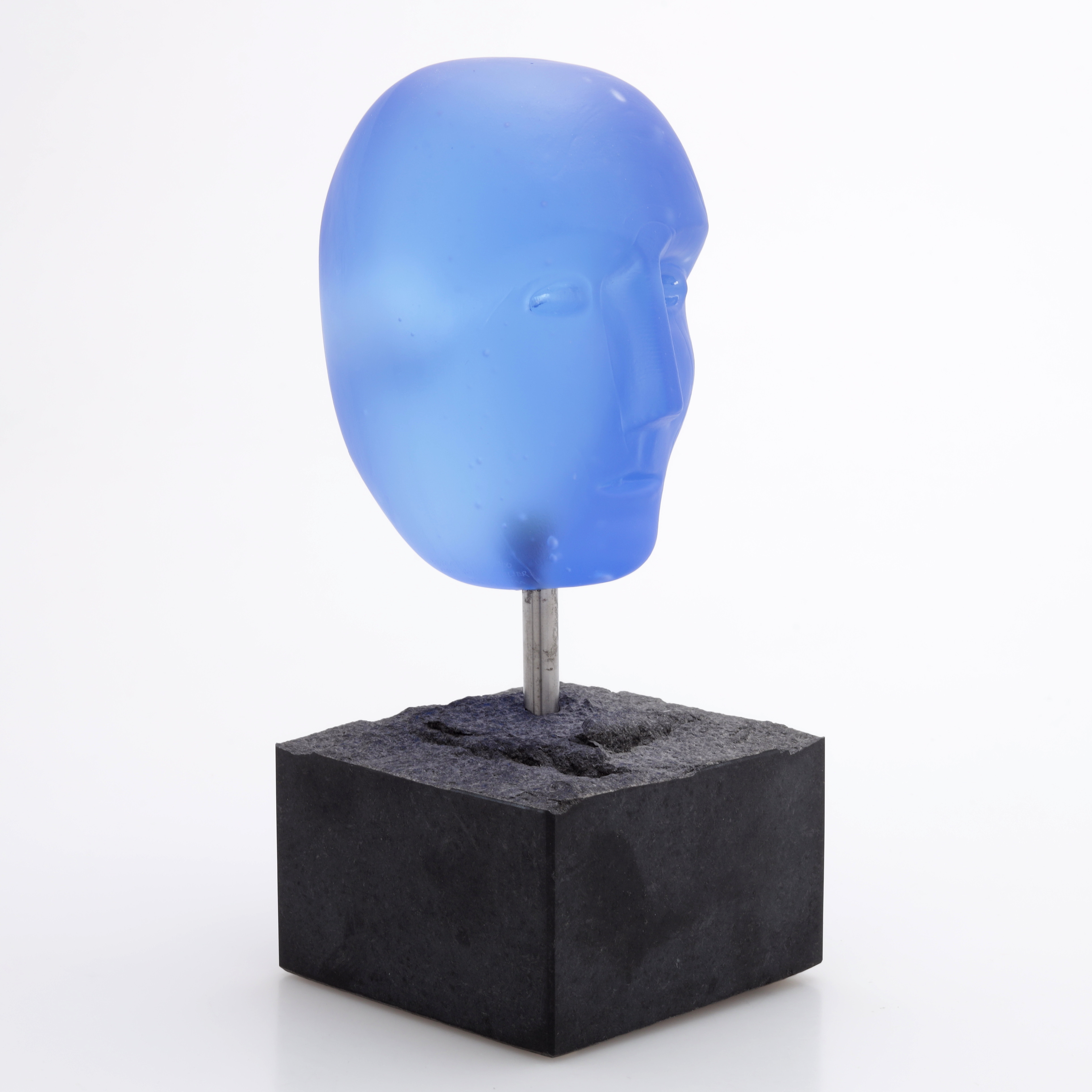 BERTIL VALLIEN. Skulptur på stensockel, glas, huvud, Kosta Boda, signerad.