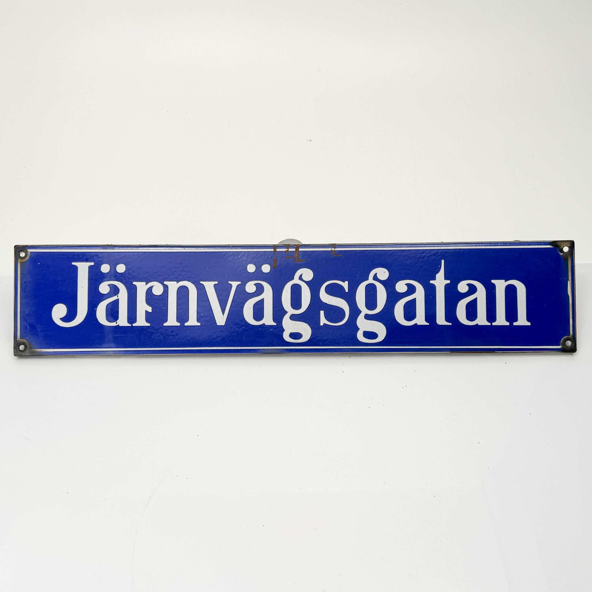 JÄRNVÄGSGATAN, emaljskylt, 1900-talets första hälft.