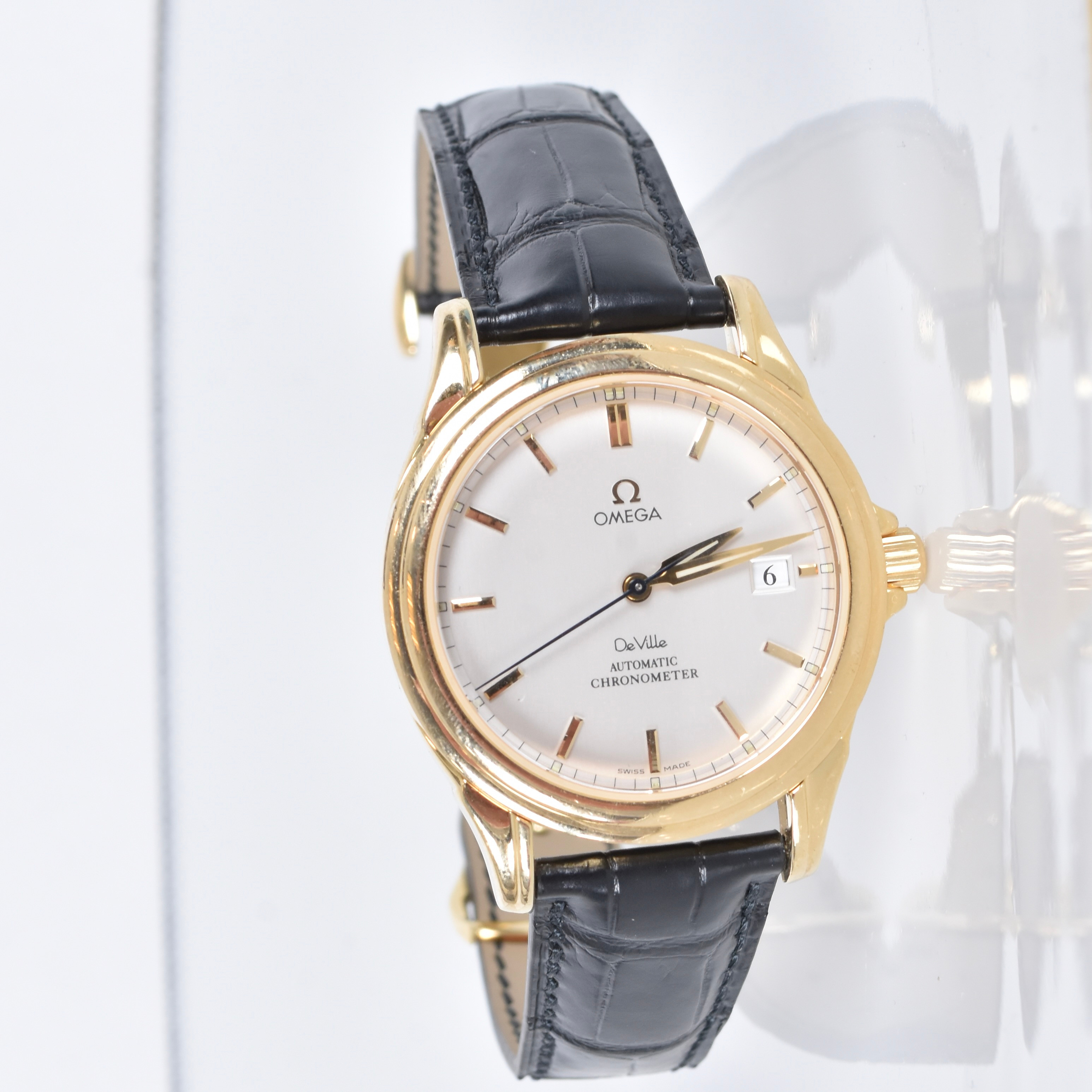HERRARMBANDSUR, 18 karat rödguld, Omega De Ville.