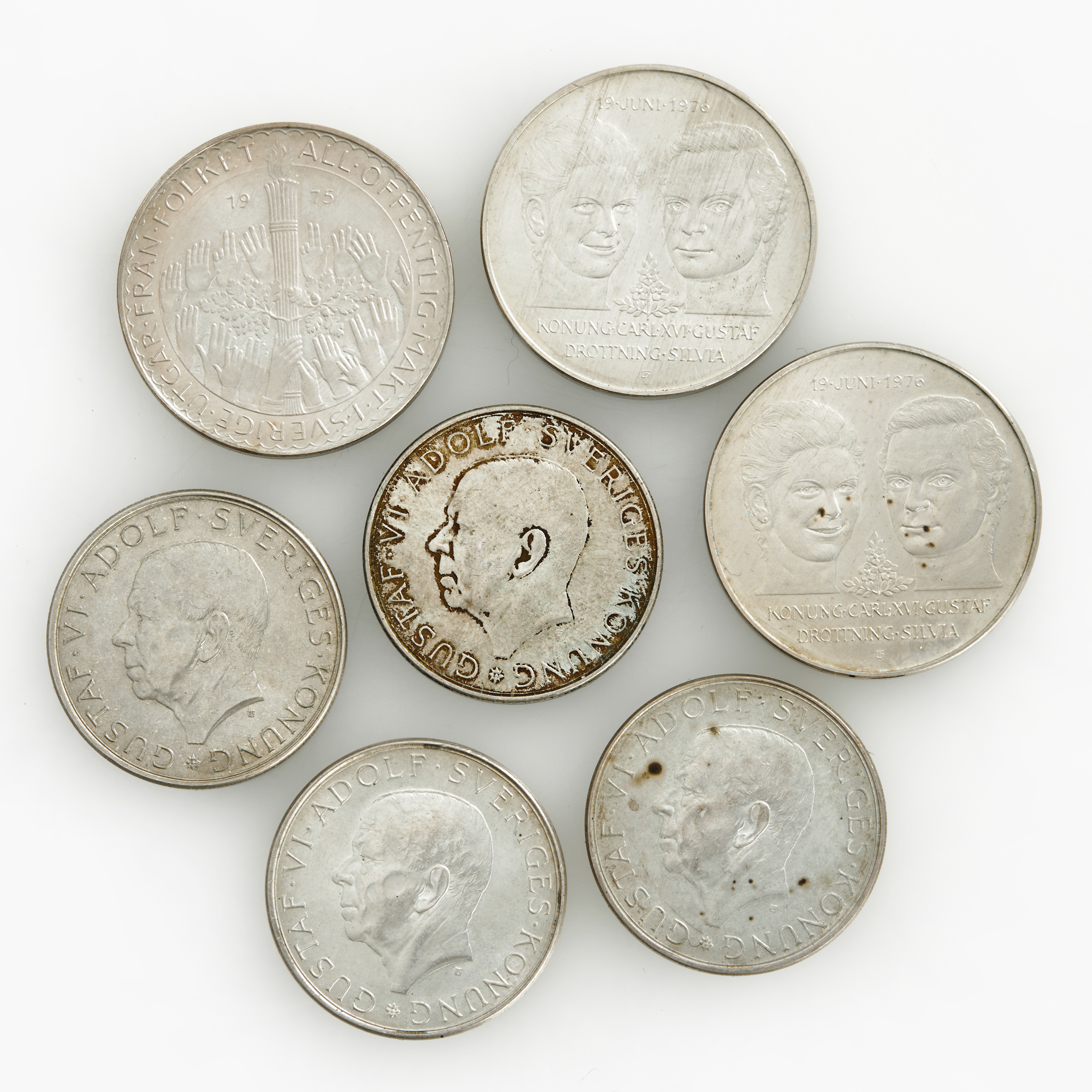 SILVERMYNT, 3 st 50-kronor 1975-76, 4 st 10-kronor 1972.