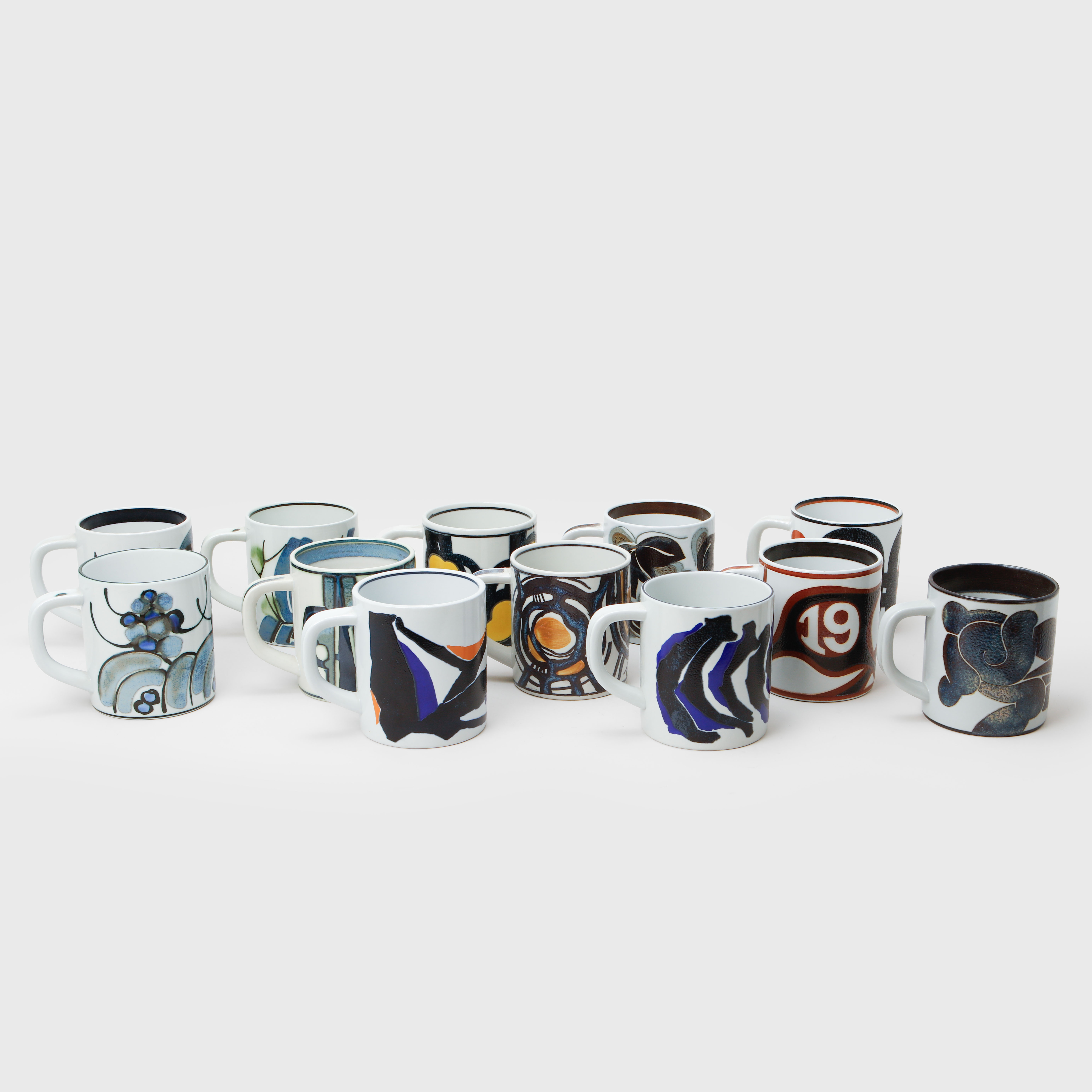 ÅRSMUGGAR, 12 st, fajans och silver, Royal Copenhagen, 1971-83.