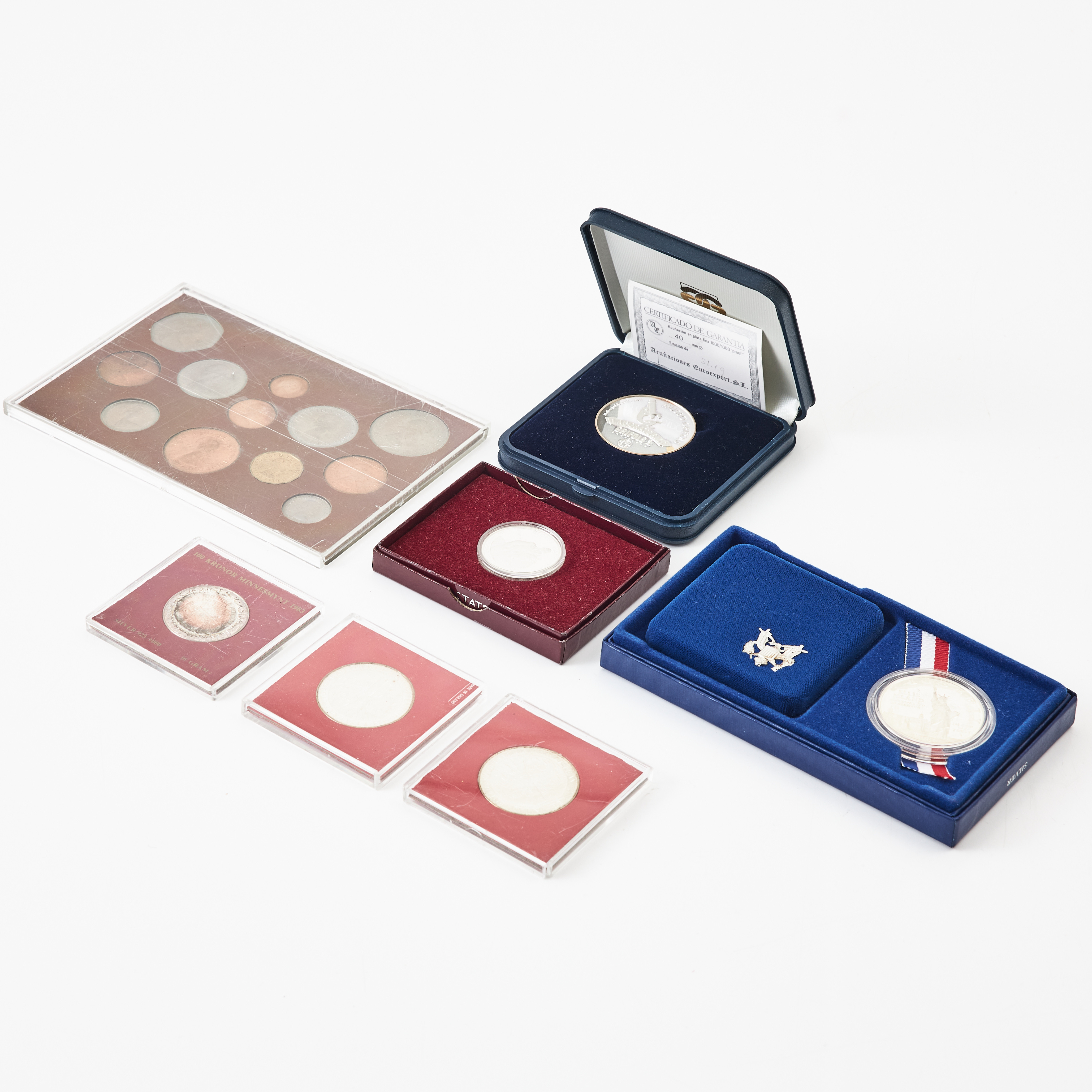 MINNESMYNT., 3 st., 50 kr resp 100 kr, sterlingsilver, MINNESMYNT, finsilver, Museo Grifols, MINNESMYNT, 2 st., silver (90%), half dollar resp. one dollar, 250-års jubileet av GW:s födelse, design Elizabeth Jones resp. Frihetsgudinnan, Ellis Island.